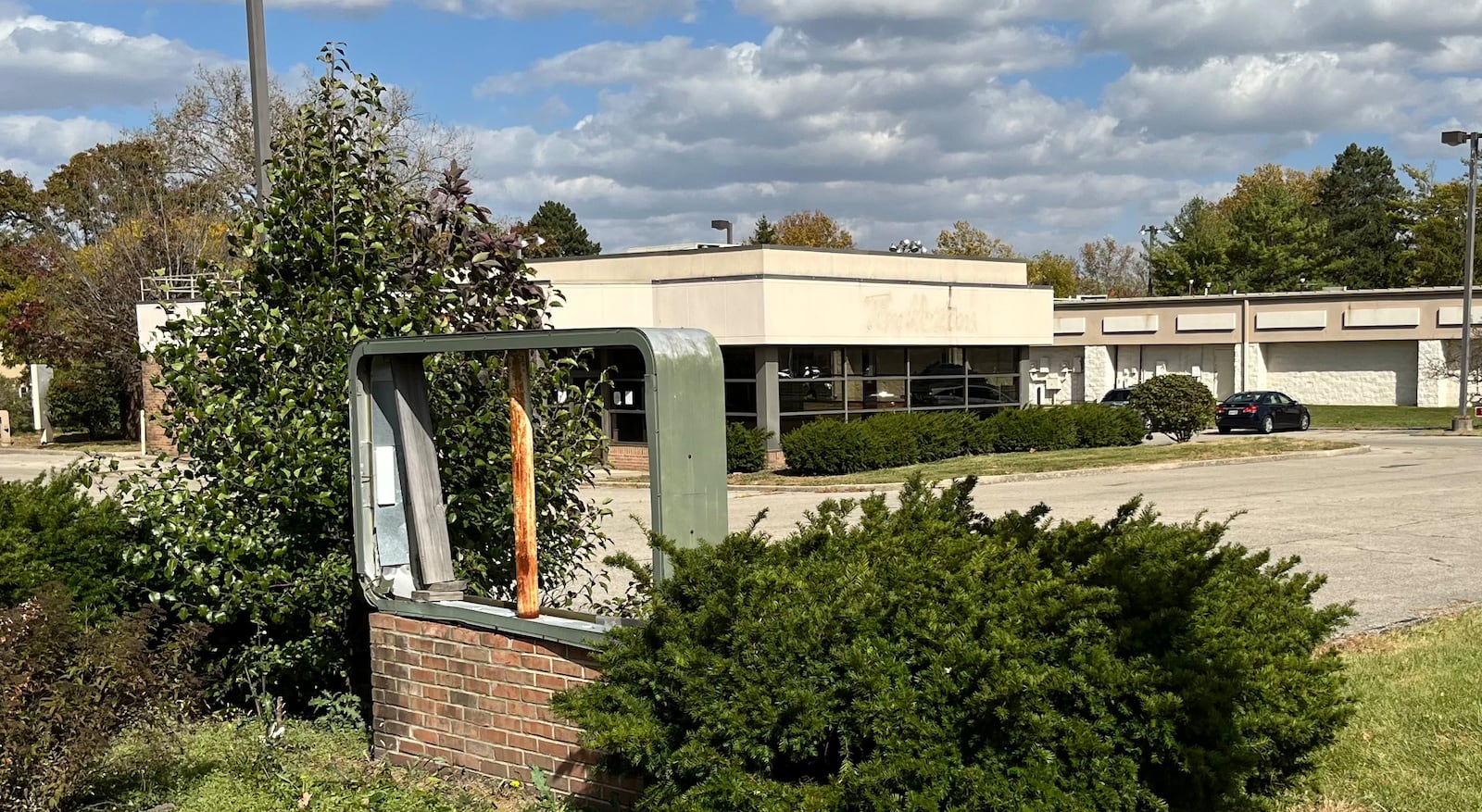 The former Tim Hortons restaurant at 665 Miamisburg Centerville Road shut its doors in early May 2017. Since then, it has accrued 35 nuisance violations, with fines assessed to its property taxes. JEREMY KELLEY/STAFF