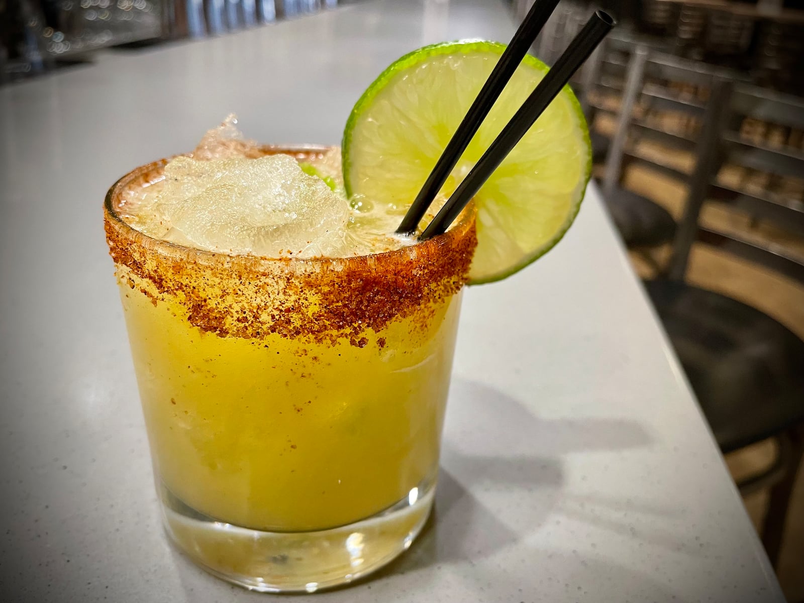 The Spicy Mango Margarita at Loose Ends Brewing Company features a hatch chili rim, jalapenos, mango puree, fresh agave, lime juice and tequila. NATALIE JONES/STAFF