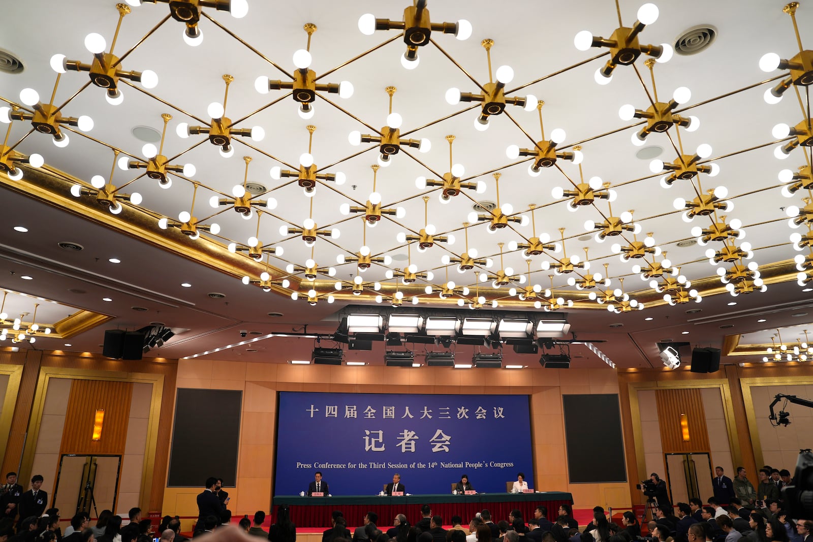 Chinese Foreign Minister Wang Yi attends a press conference on the sideline of the National People's Congress in Beijing, Friday, March 7, 2025. (AP Photo/Ng Han Guan)