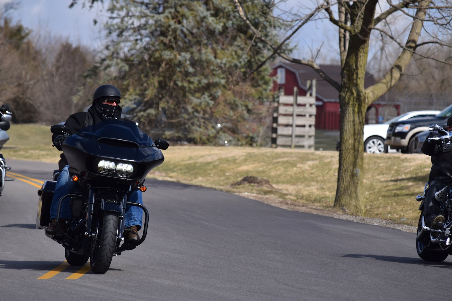 PHOTOS: Thousands of Outlaws attend motorcycle gang leaders funeral at Montgomery County Fairgrounds.