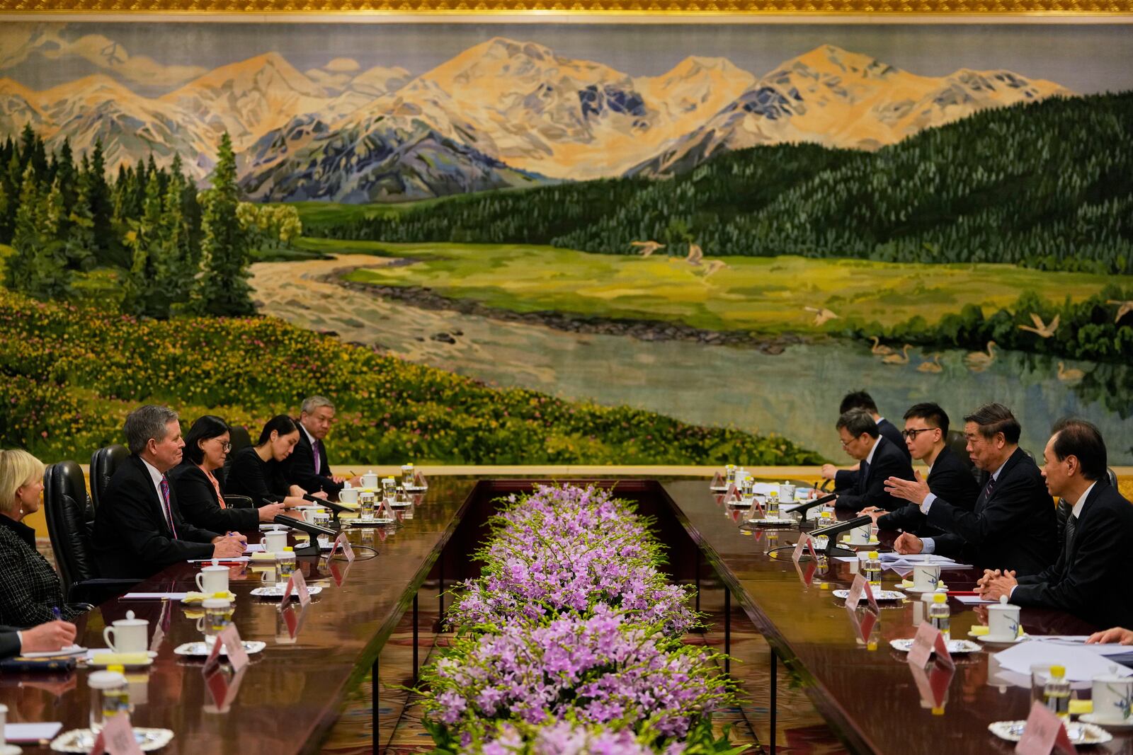 Chinese Vice Premier He Lifeng, second right, holds talks with U.S. Sen. Steve Daines, second from left, before a meeting held at the Xinjiang Room at the Great Hall of the People in Beijing, China, Saturday, March 22, 2025. (AP Photo/Ng Han Guan, Pool)