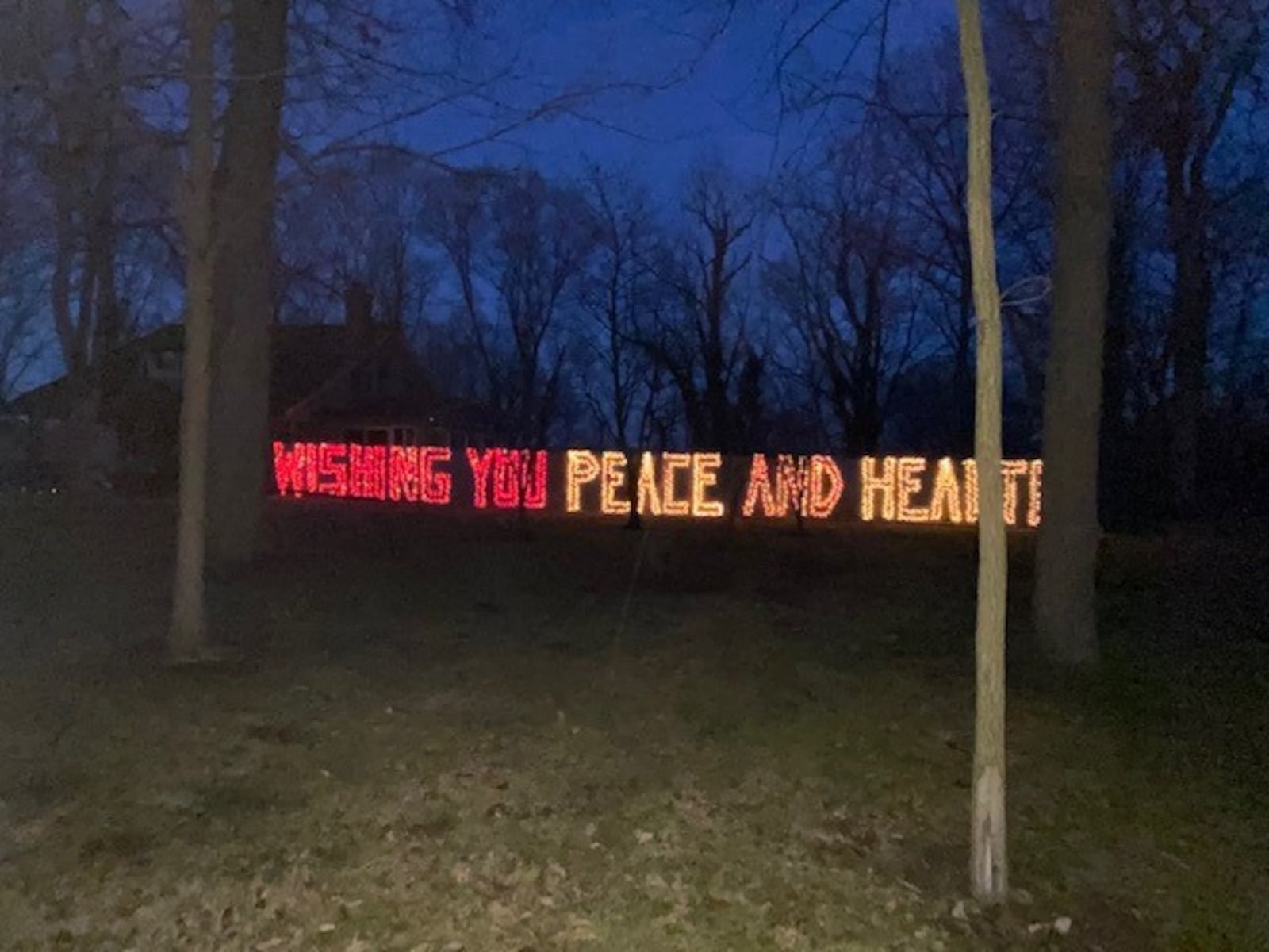 Thomas Loges and his wife, Amy, have created this heartwarming message outside of their Harrison Township home.