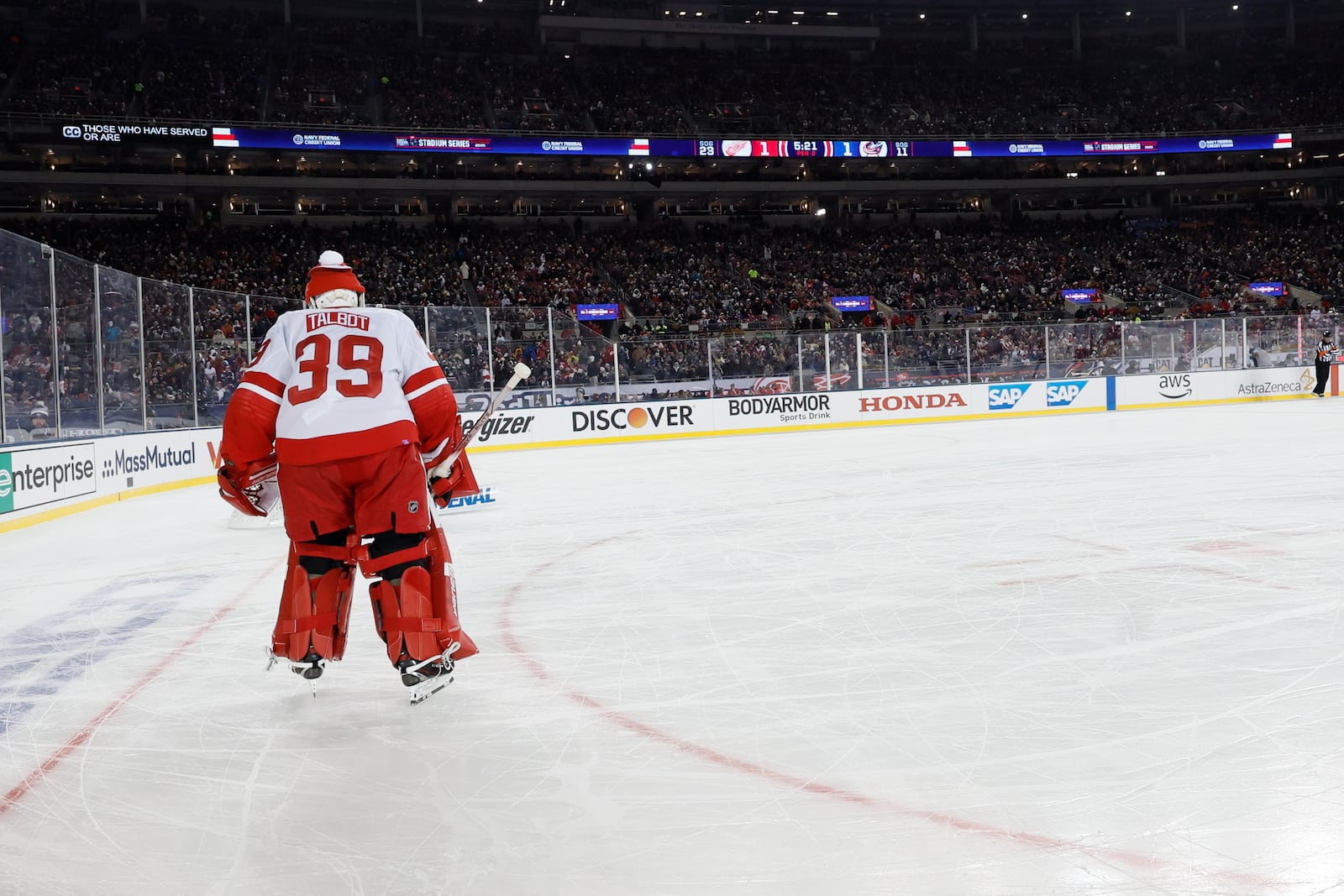 Detroit Red Wings' Cam Talbot skates to the goal during a time out against the Columbus Blue Jackets play during the second period of the Stadium Series NHL hockey game at Ohio Stadium, Saturday, March 1, 2025, in Columbus, Ohio. (AP Photo/Jay LaPrete)