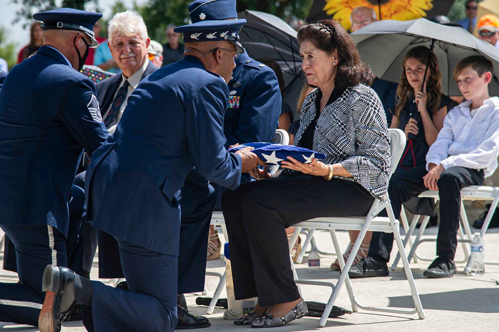 Air Force Chief of Staff Gen. CQ Brown Jr. presents the U.S. flag to retired Col. Richard E. Cole’s daughter, Cindy Chal, during his interment ceremony, Sept. 7 at the Fort Sam Houston National Cemetery, Texas. Cole was Jimmy Doolittle’s co-pilot in the lead plane of an important mission in the history of air power, the bombing raid on Japan in retaliation for its attack on Pearl Harbor. Cole was the last survivor of the 80 Doolittle raiders who executed America’s first strikes against the Japanese in World War II. U.S. AIR FORCE PHOTO