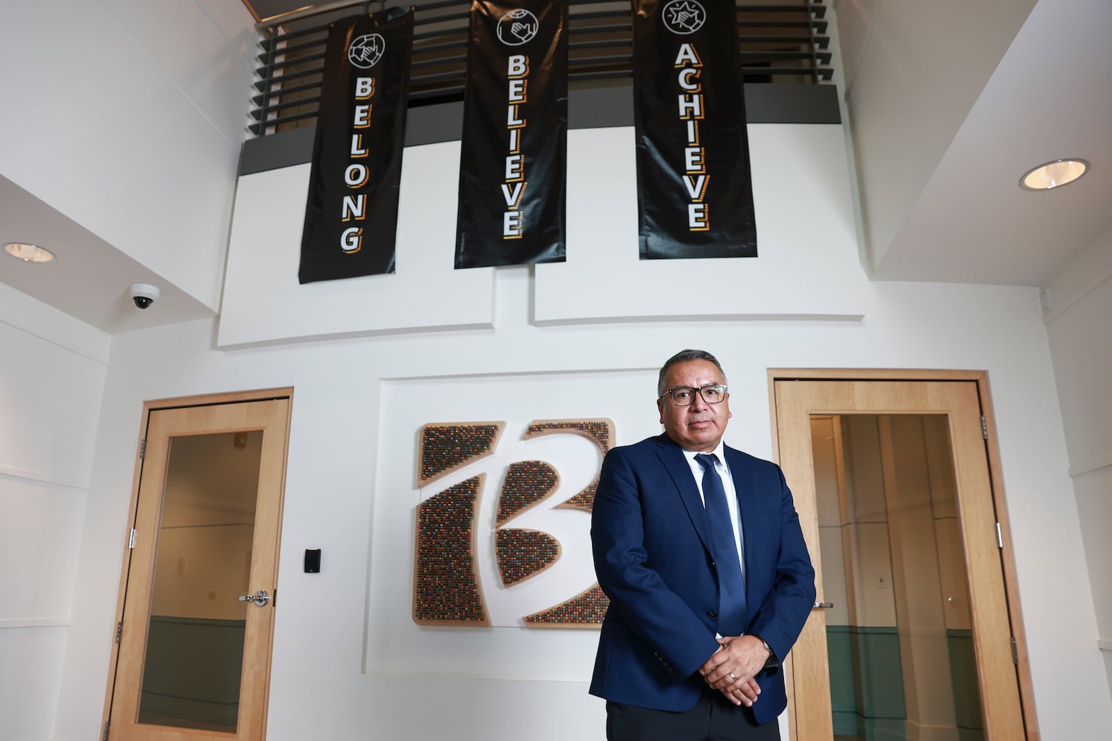 Gustavo Balderas, superintendent of Beaverton School District, stands for a photo in the lobby of the district administrative office in Beaverton, Ore., Monday, Nov. 25, 2024. (AP Photo/Amanda Loman)