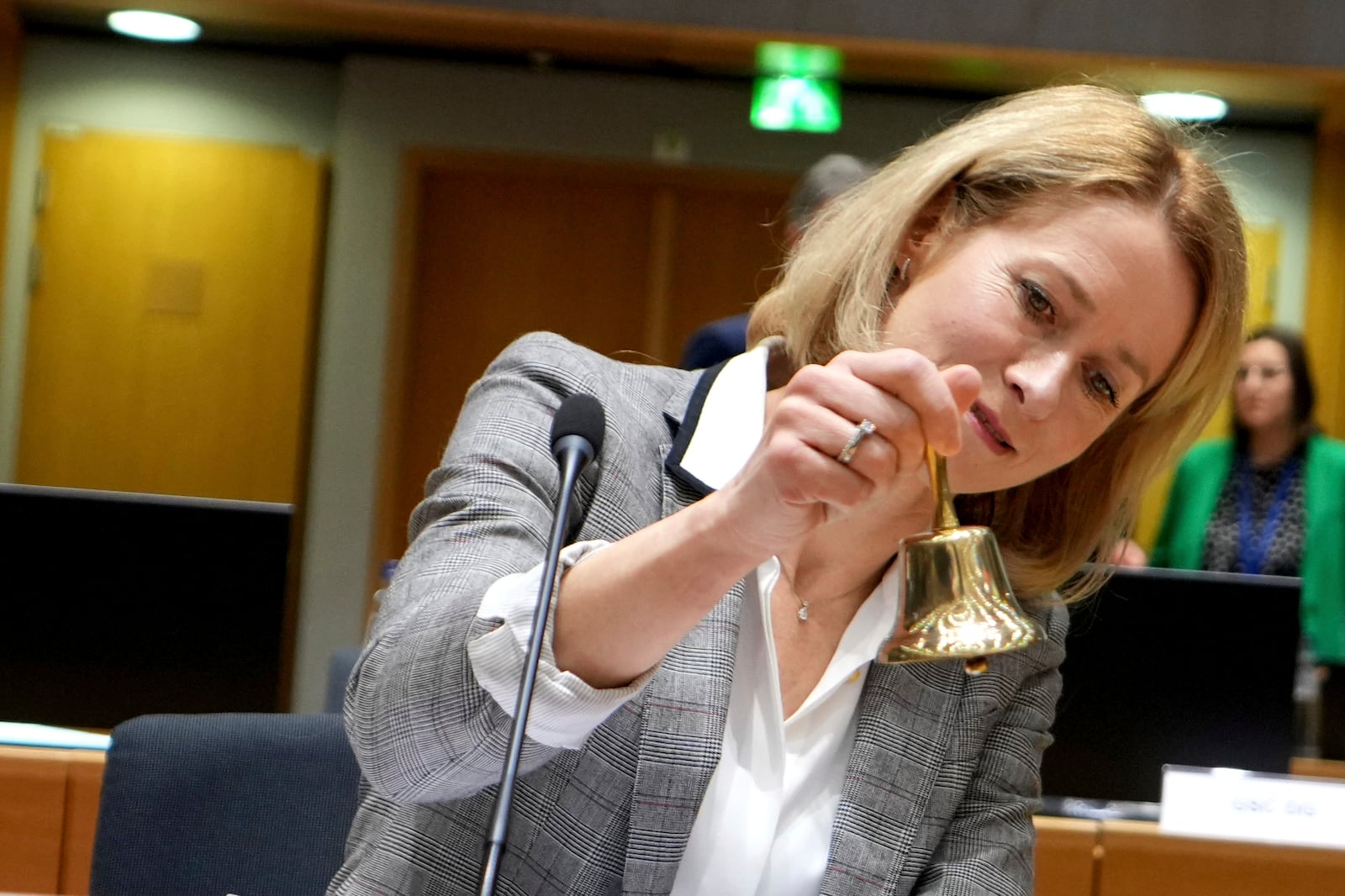 European Union foreign policy chief Kaja Kallas rings a bell to signify the start of a meeting of EU foreign ministers at the European Council building in Brussels, Monday, Dec 16, 2024. (AP Photo/Virginia Mayo)