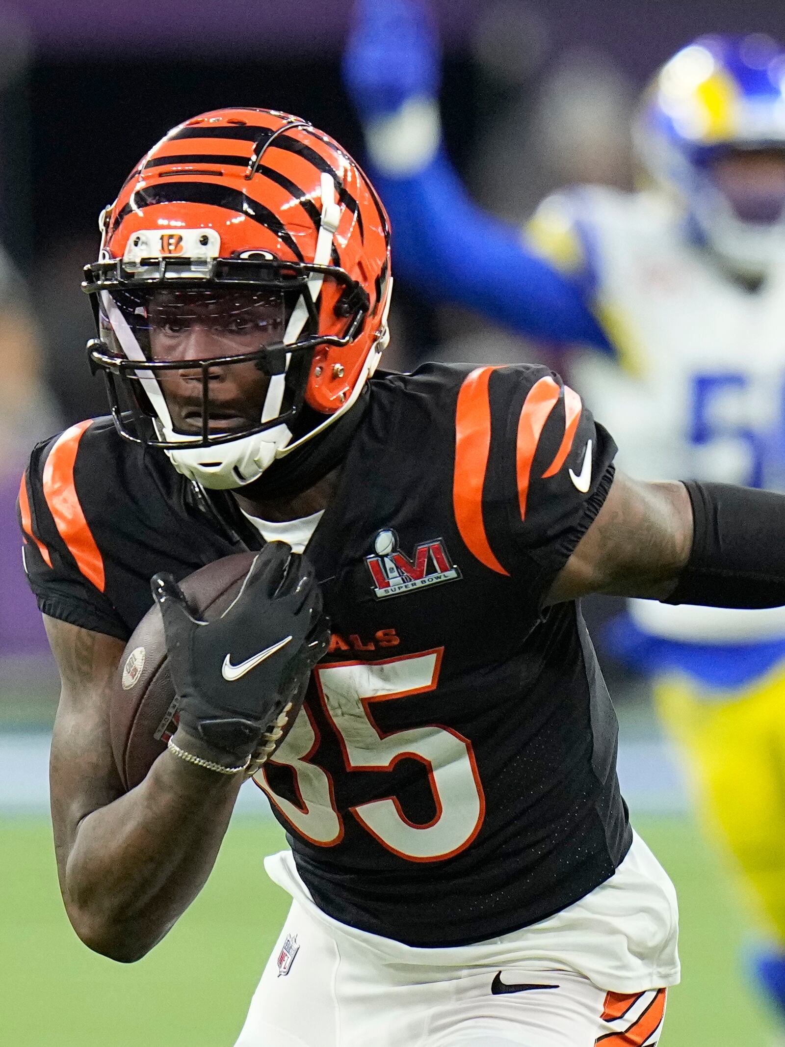 Cincinnati Bengals wide receiver Tee Higgins (85) runs for a touchdown after catching a pass against the Los Angeles Rams during the second half of the NFL Super Bowl 56 football game Sunday, Feb. 13, 2022, in Inglewood, Calif. (AP Photo/Chris O'Meara)