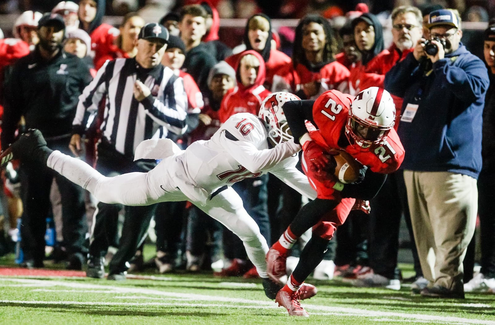 Fairfield’s Dashaun Simpkins is taken down by Colerain’s Sean Williamson during their football game Friday, Nov. 1, 2019 at Fairfield Stadium. Colerain put an end to Fairfield’s undefeated season with a 16-10 overtime win. Fairfield ended the regular season 9-1. NICK GRAHAM/STAFF