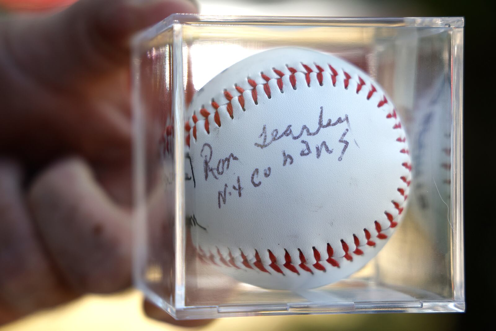 An autographed baseball by Negro League player Ron Teasley. BILL LACKEY/STAFF