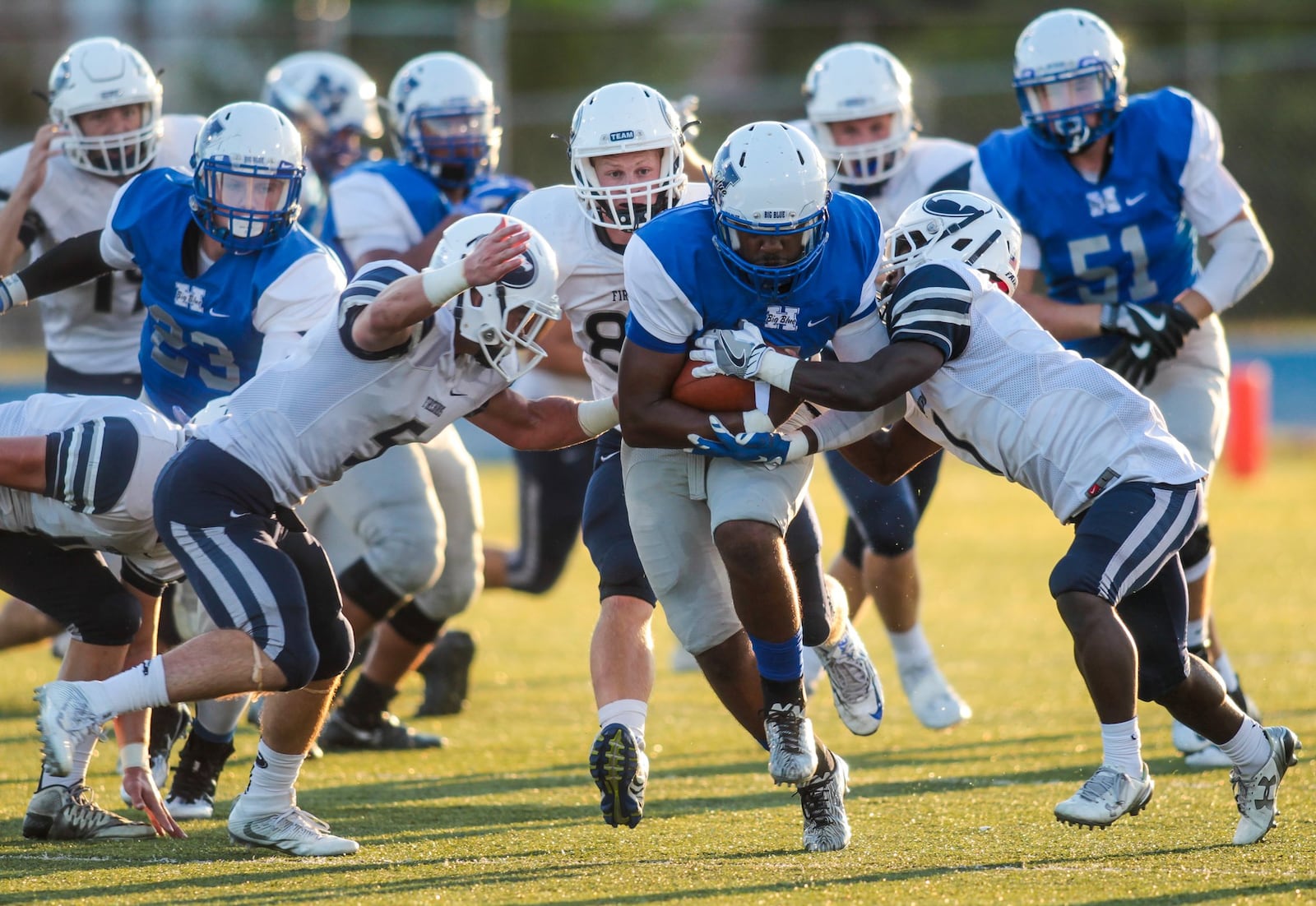 Hamilton quarterback Eric Jackson carries the ball during the first quarter of their game against Kettering Fairmont Friday, Sept. 2, 2016 at Hamilton High School in Hamilton. NICK GRAHAM/STAFF