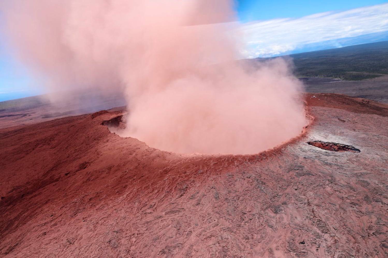 Photos: Hawaii volcano erupts