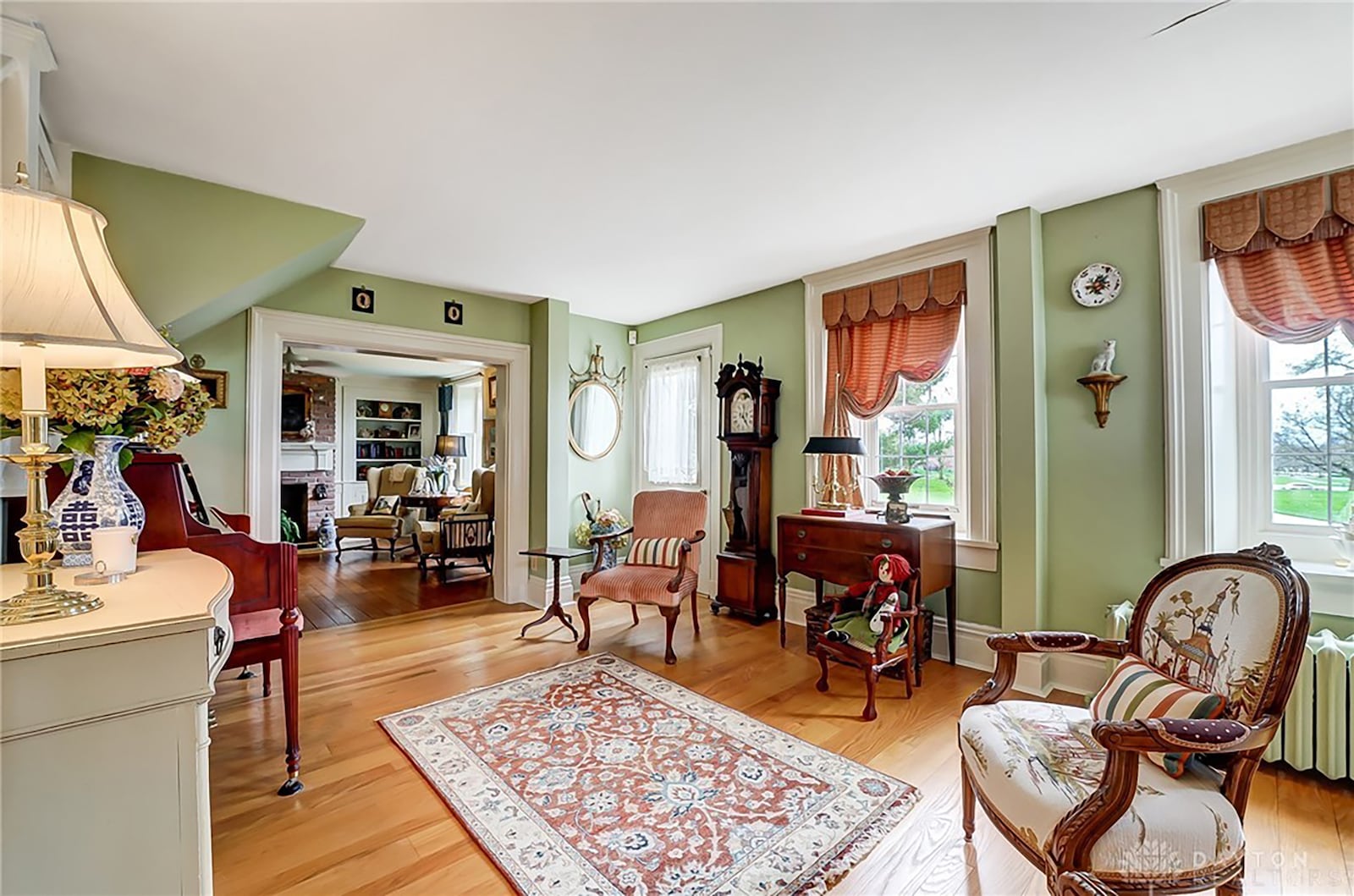 The historical home also has a front parlor that connects to the living room in the rear.