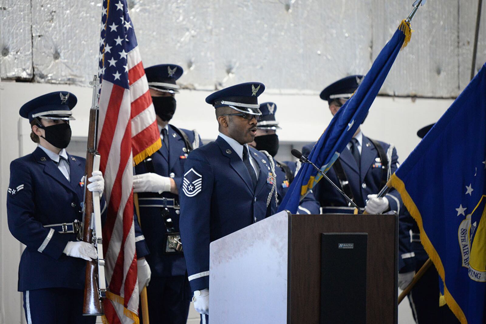 Master Sgt. Joshua Lane, NCO in charge of the Honor Guard, sings the national anthem during the graduation ceremony of 28 new ceremonial guardsmen April 20 at Wright-Patterson Air Force Base. U.S. AIR FORCE PHOTO/TY GREENLEES