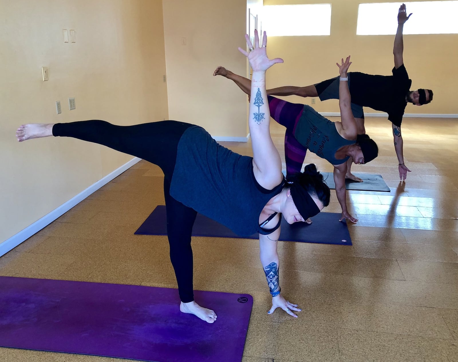 “The blindfolds can bring a playful quality to it,” said Devon Schmidt, an instructor and the owner of Day Yoga. CONTRIBUTED