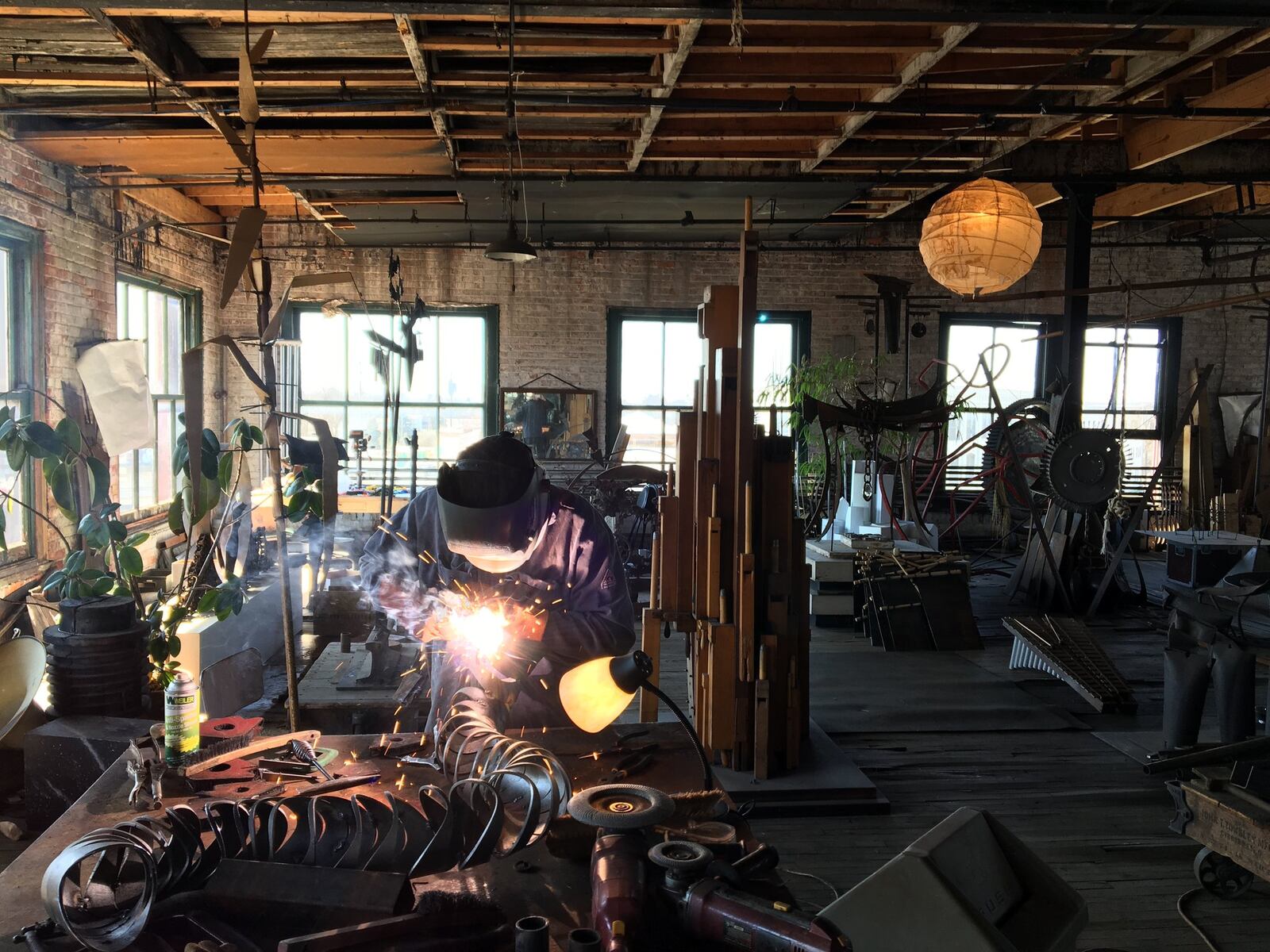 “I didn’t want to give up music and I didn’t want to give up sculpture so I found a way to synthesize the two art forms,” said Michael Bashaw, shown in his Dayton studio. CONTRIBUTED