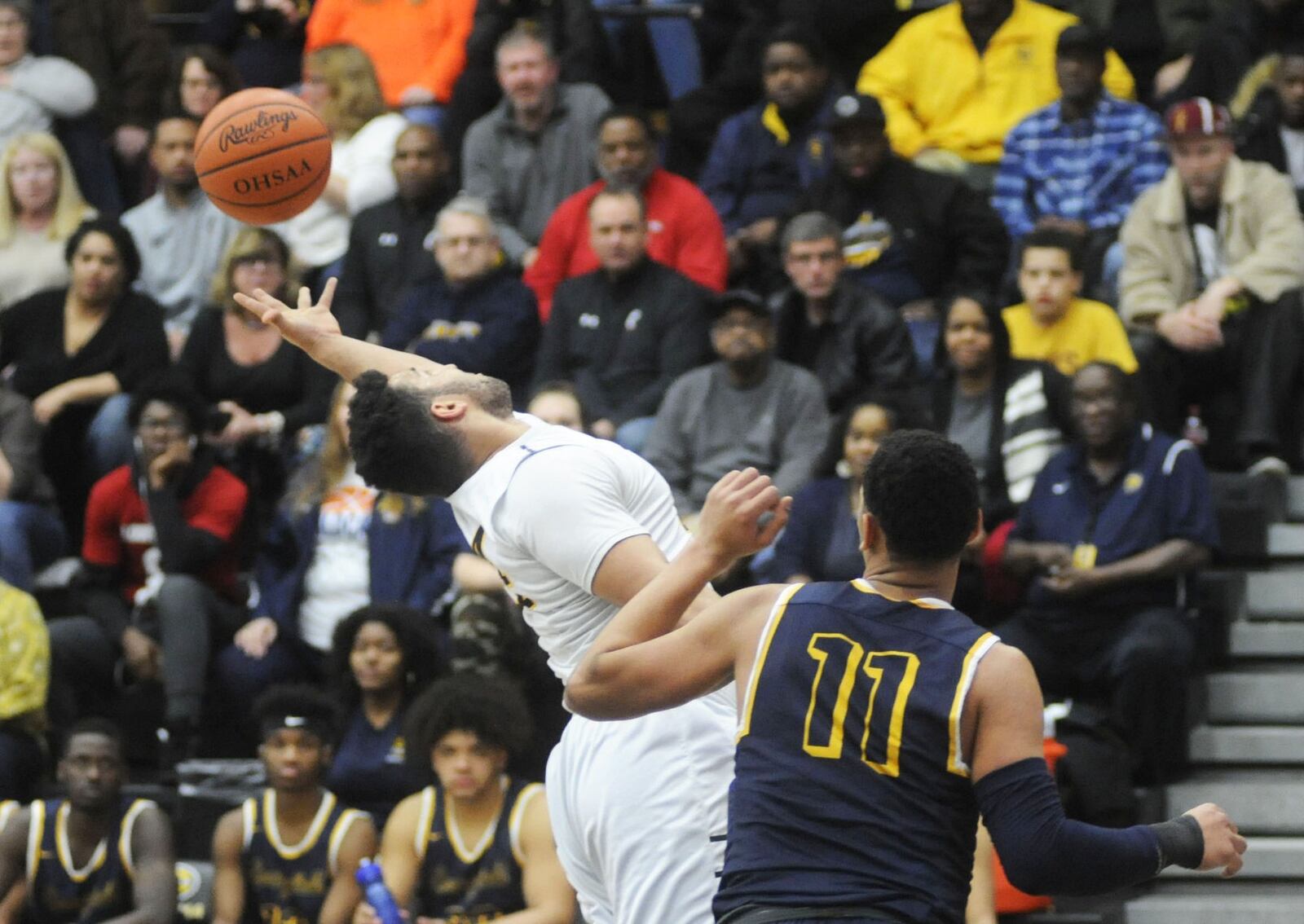 Centerville’s Jevon Henderson (44) and Springfield’s Leonard rebound. Centerville defeated visiting Springfield 50-48 in a boys high school basketball game on Friday, Feb. 2, 2018. MARC PENDLETON / STAFF