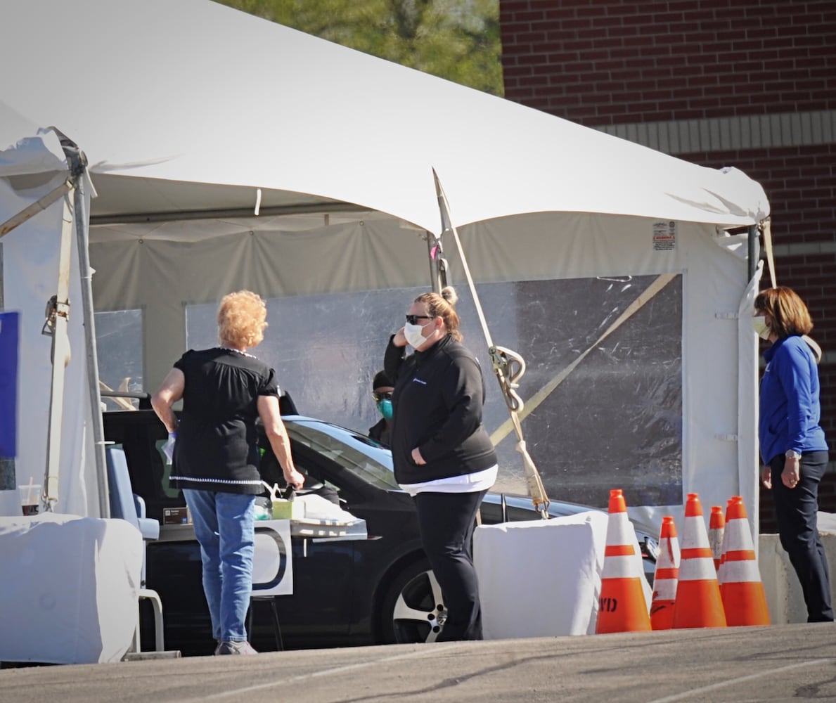 PHOTOS: Crowd lines up for antibody testing at UD Arena