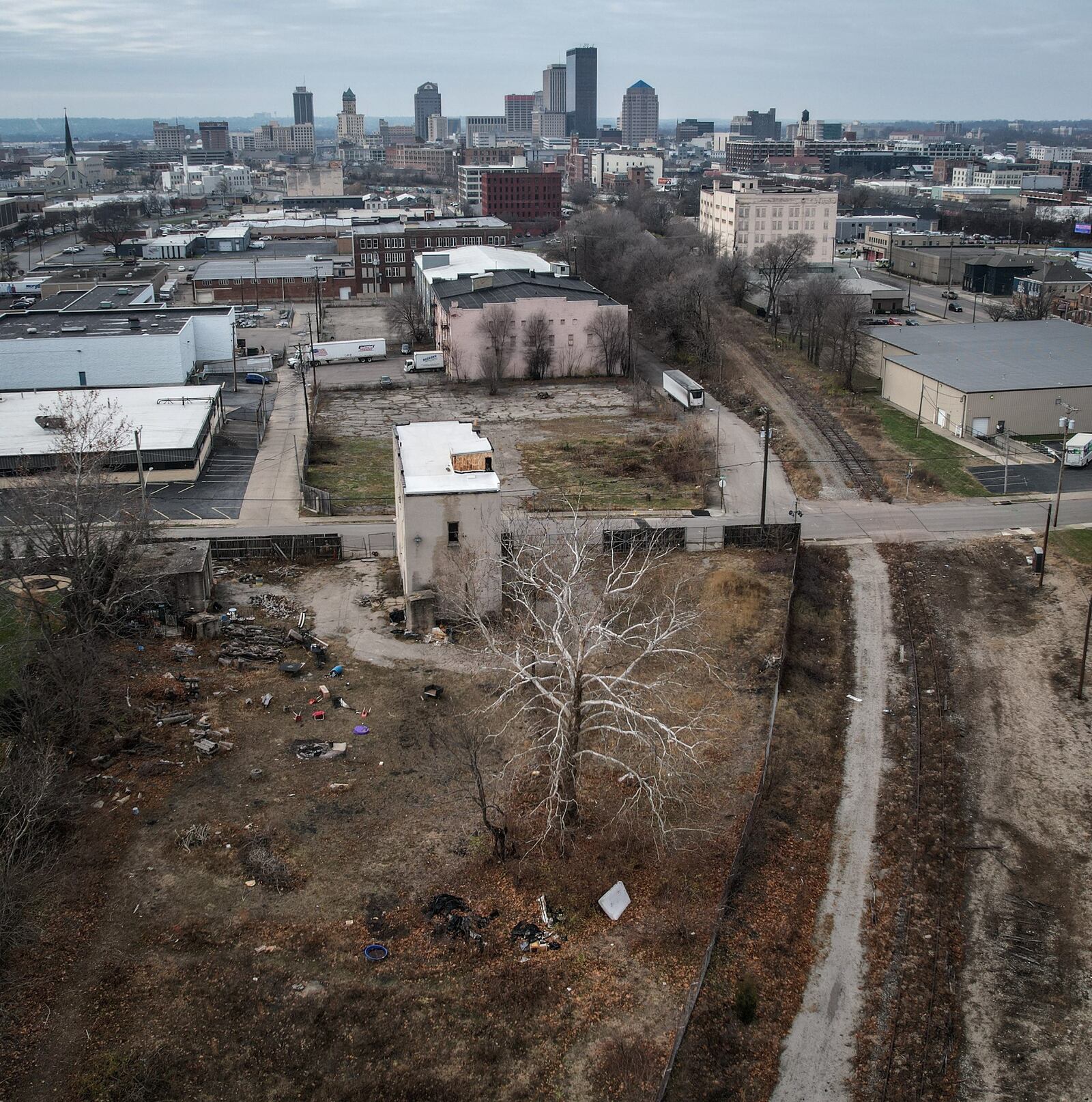 The out-of-service Norfolk Southern rail line that runs on Dayton's eastside, near the Oregon District, crosses Fifth Street and follows Hamilton Avenue out of town may be turned into a multi-use recreational trail. The city is trying to purchase the 6.5-mile track for the "Flight Line" rails-to-trails project. JIM NOELKER/STAFFJIM NOELKER/STAFF