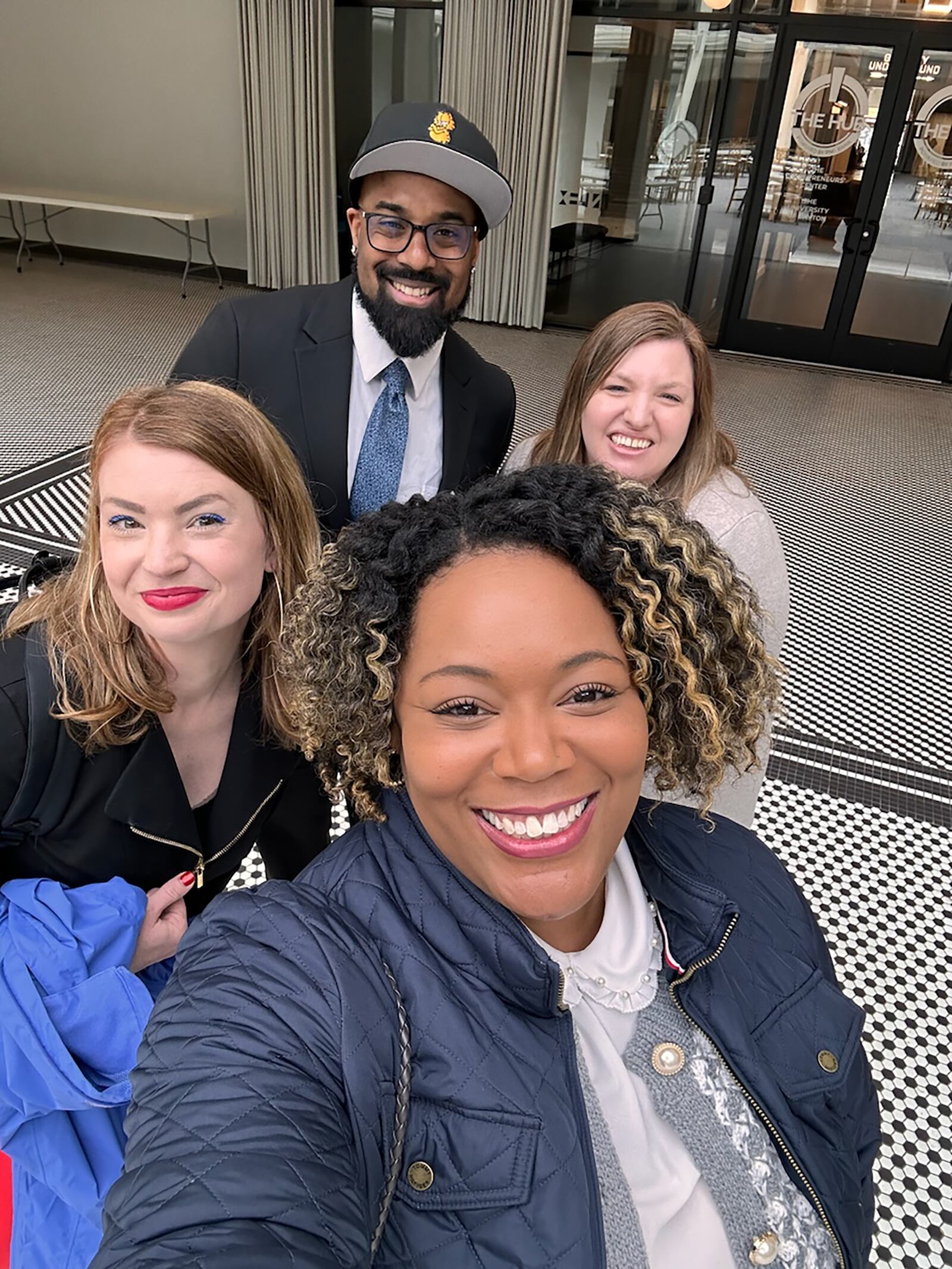 Cosby (rear) and his staff at Bottom Line (L - R) - Emily Broughton, Alexandria Burns and Jocelin Dean