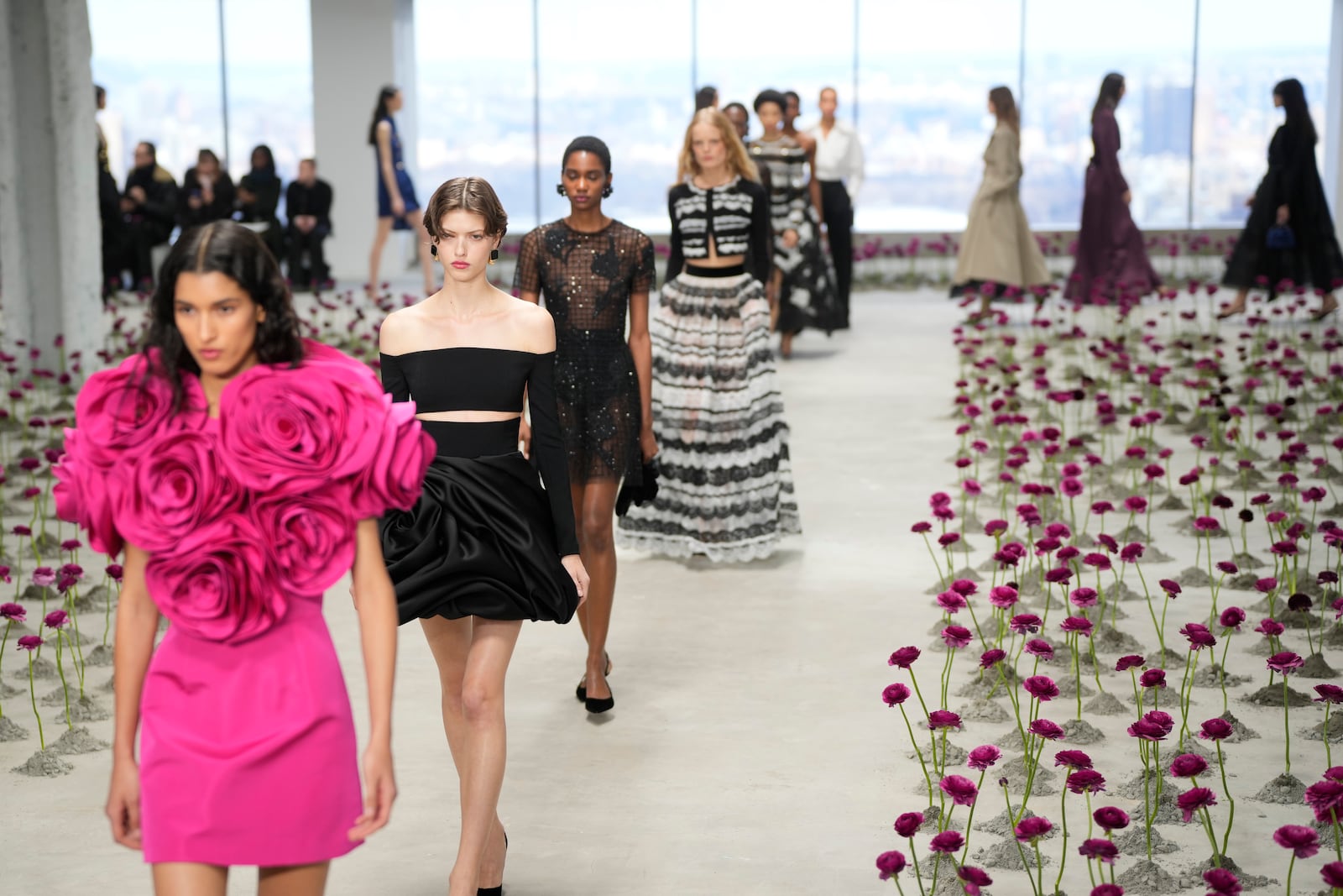 Models walk the runway during the Carolina Herrera Fall/Winter 2025 fashion show as part of New York Fashion Week on Monday, Feb. 10, 2025, in New York. (Photo by Charles Sykes/Invision/AP)