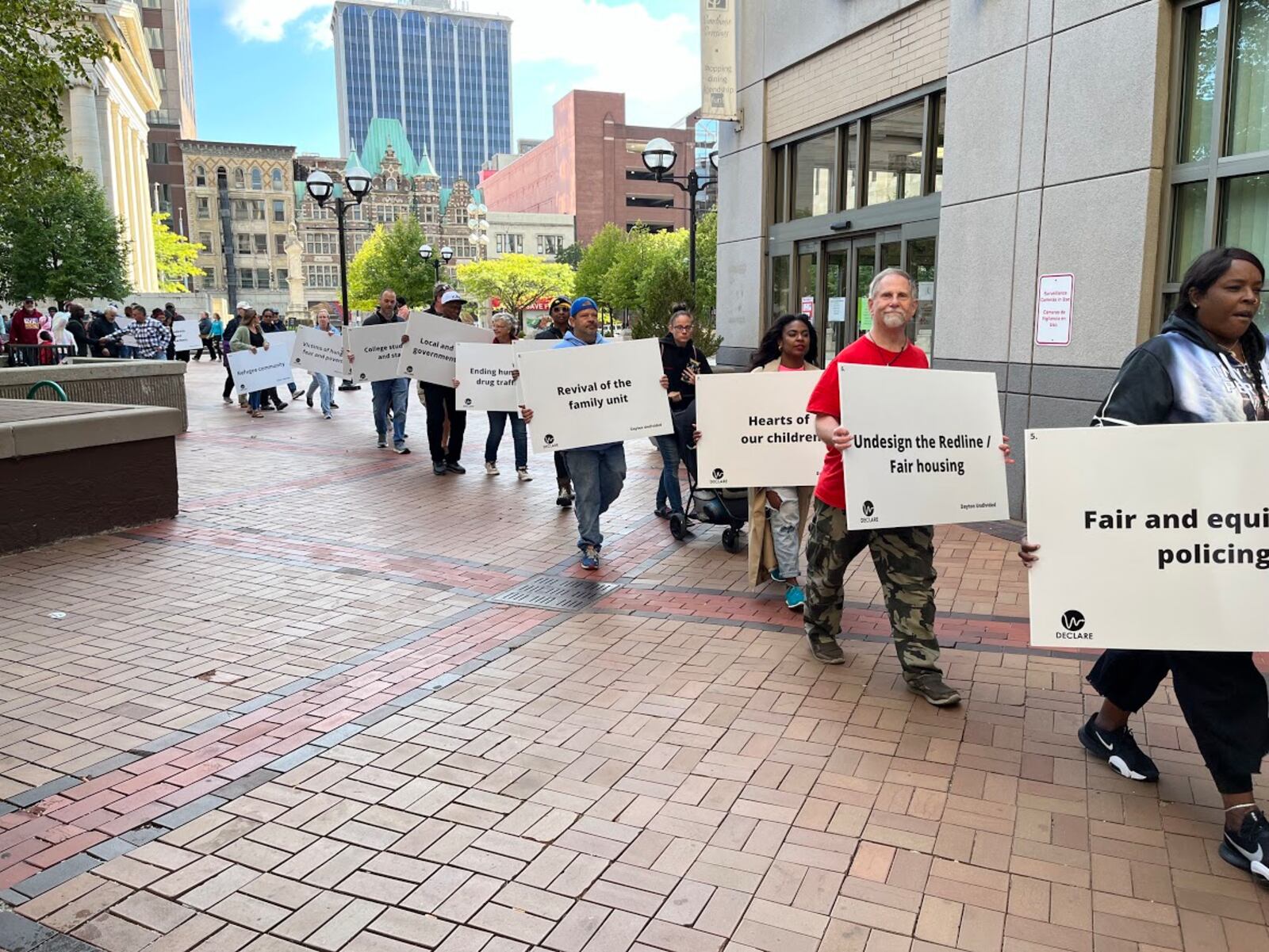 Participants in Sunday's Dayton Declare prayer march began their 1.5-mile trek to Levitt Pavilion from Courthouse Square. THOMAS GNAU/STAFF