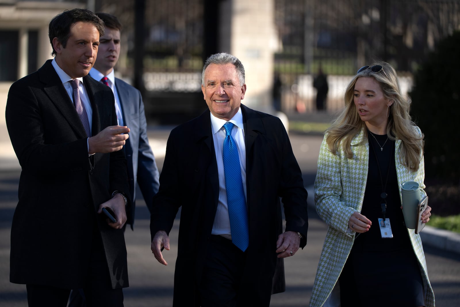 Steve Witkoff, left, White House special envoy, walks toward the Oval Office at the White House, Wednesday, March 19, 2025, in Washington. (AP Photo/Mark Schiefelbein)