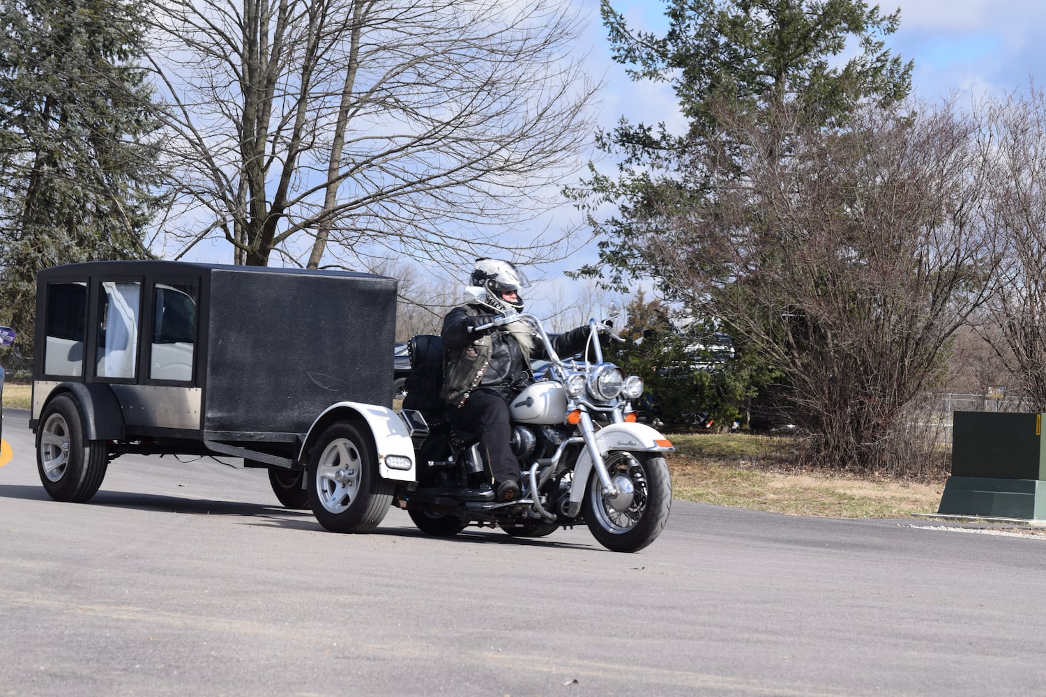 PHOTOS: Thousands of Outlaws attend motorcycle gang leaders funeral at Montgomery County Fairgrounds.