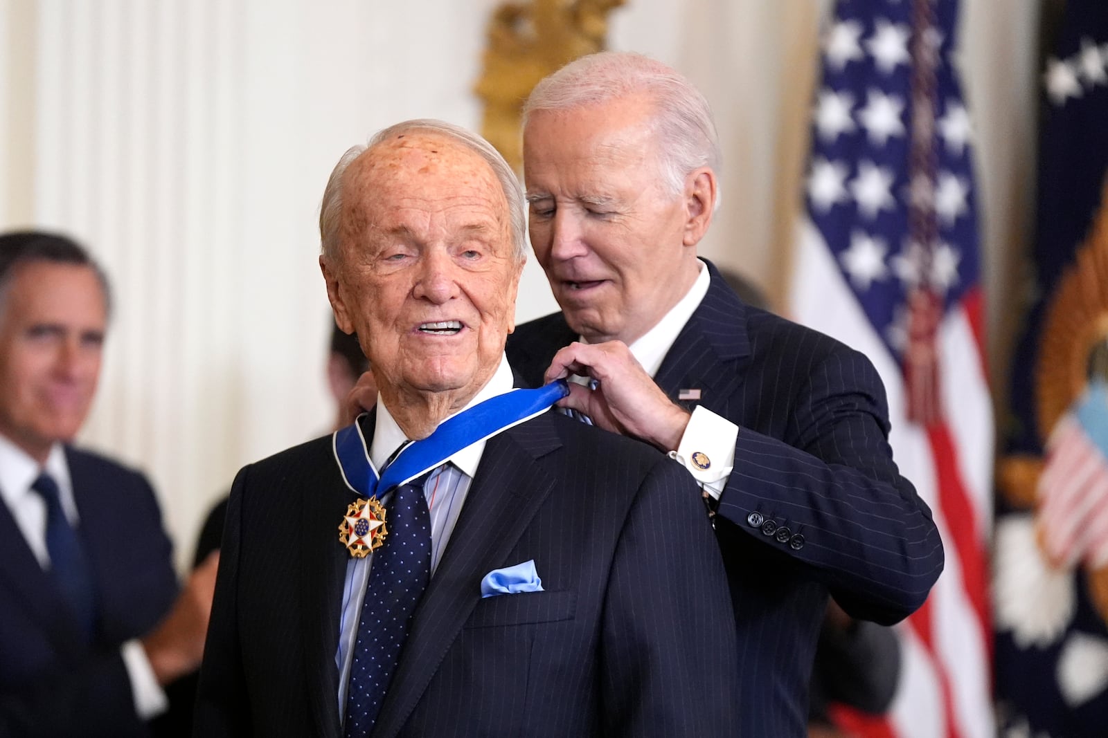 President Joe Biden, right, presents the Presidential Medal of Freedom, the Nation's highest civilian honor, to writer George Stevens, Jr. in the East Room of the White House, Saturday, Jan. 4, 2025, in Washington. (AP Photo/Manuel Balce Ceneta)