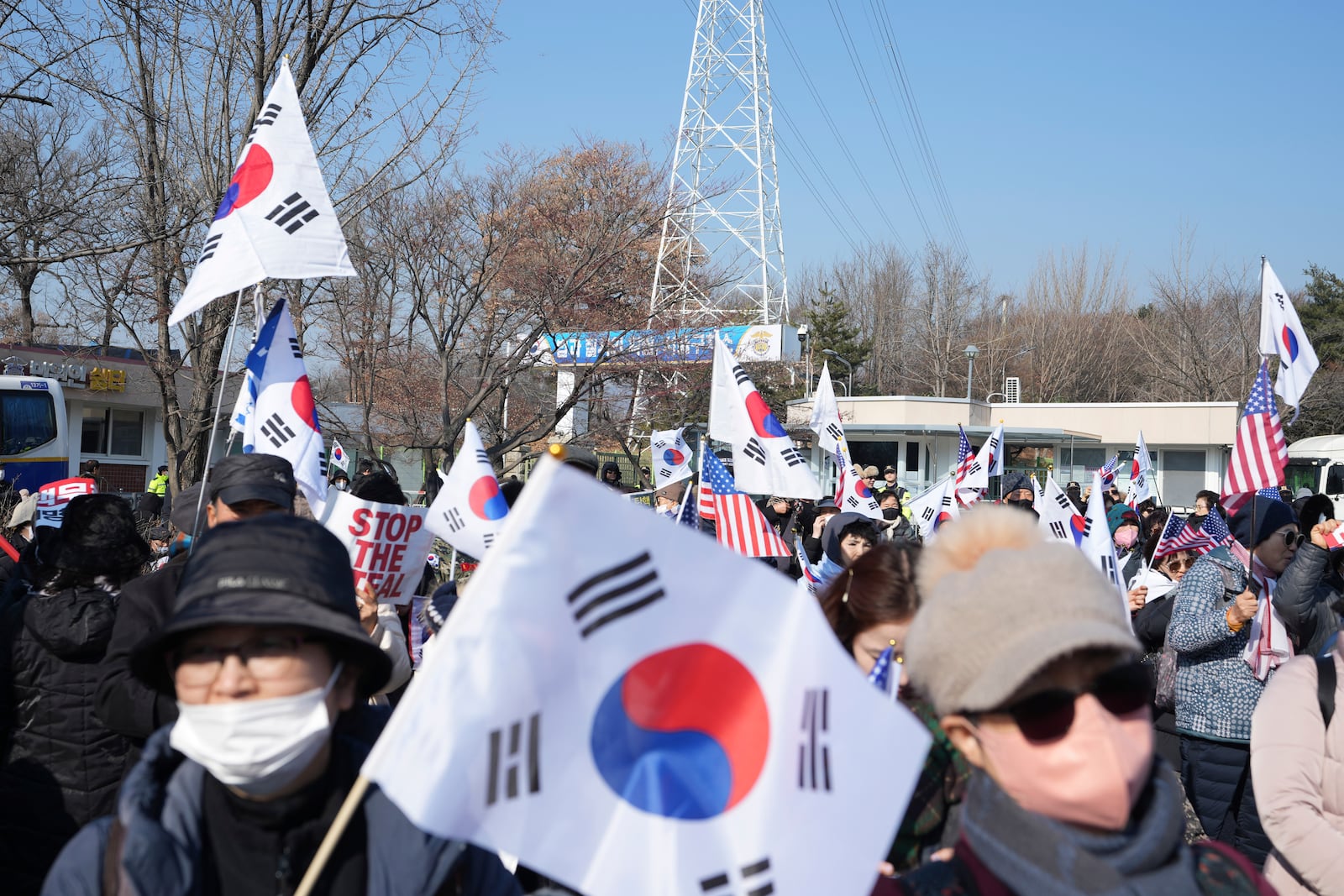 Supporters of impeached South Korean President Yoon Suk Yeol attend a rally to oppose his impeachment outside a detention center where Yoon is sent in Uiwang, South Korea, Friday, Jan. 17, 2025. (AP Photo/Lee Jin-man)