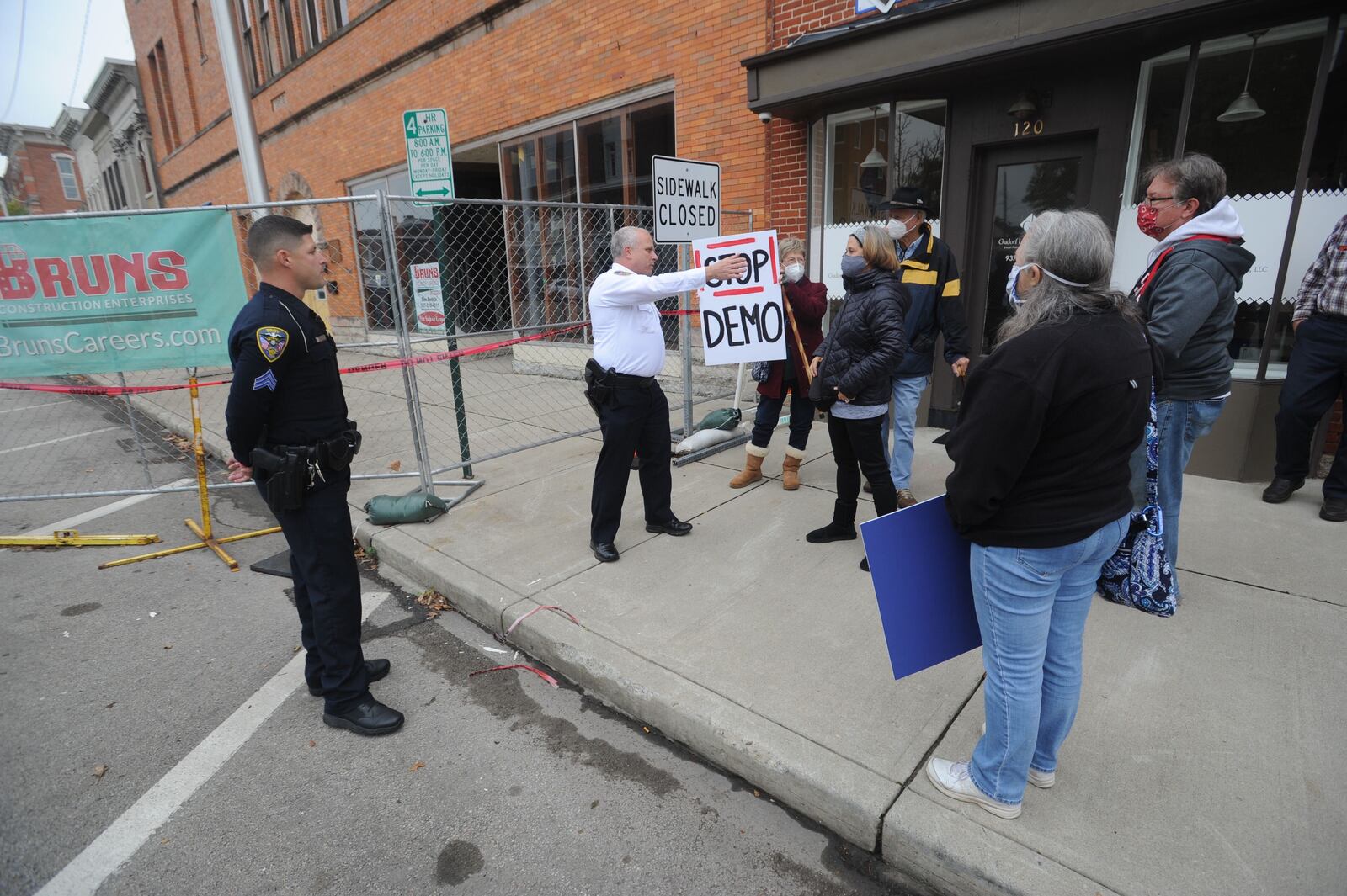 Several concerned Troy area residents protested the demolition of a Main Street building that housed an early county courthouse and an array of well-known businesses. The proposal to demolish the three-story building at 112-118 W. Main St. that was damaged during the January tornado that struck downtown Troy was voted ?????? Oct. 28, Wednesday afternoon.