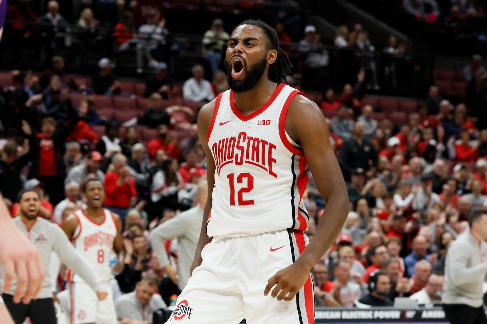 Ohio State's Evan Mahaffey celebrates scoring against Evansville during the second half of an NCAA college basketball game Tuesday, Nov. 19, 2024, in Columbus, Ohio. (AP Photo/Jay LaPrete)