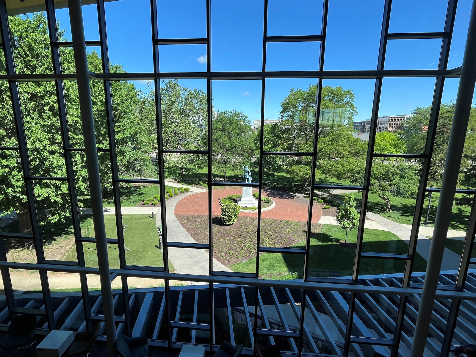 Cooper Park, as seen through the windows of the downtown Dayton Metro Library. CORNELIUS FROLIK / STAFF