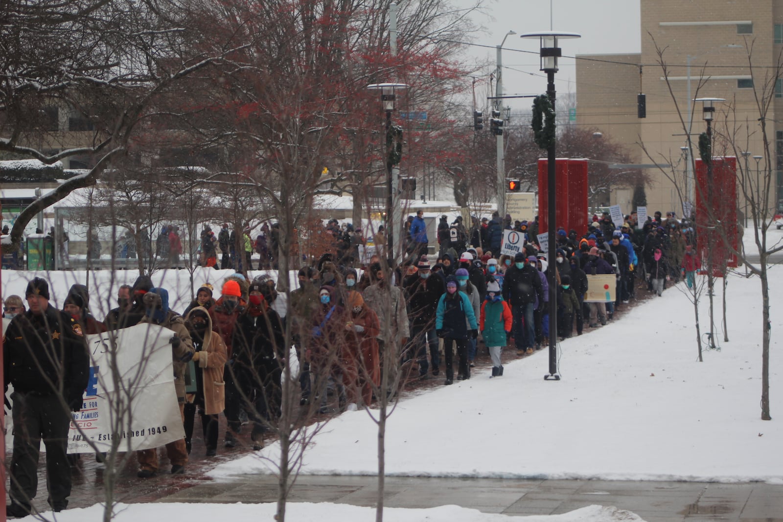 People in Dayton march in recognition of Martin Luther King Day and civil rights. This photo was taken at the 2022 march. The Dayton march for 2024 gathers at 9:30 a.m. Monday, Jan. 15 at 1323 W. Third Street/MLK Jr. (Drew Health Center). It will end at Sinclair Community College. FILE PHOTO