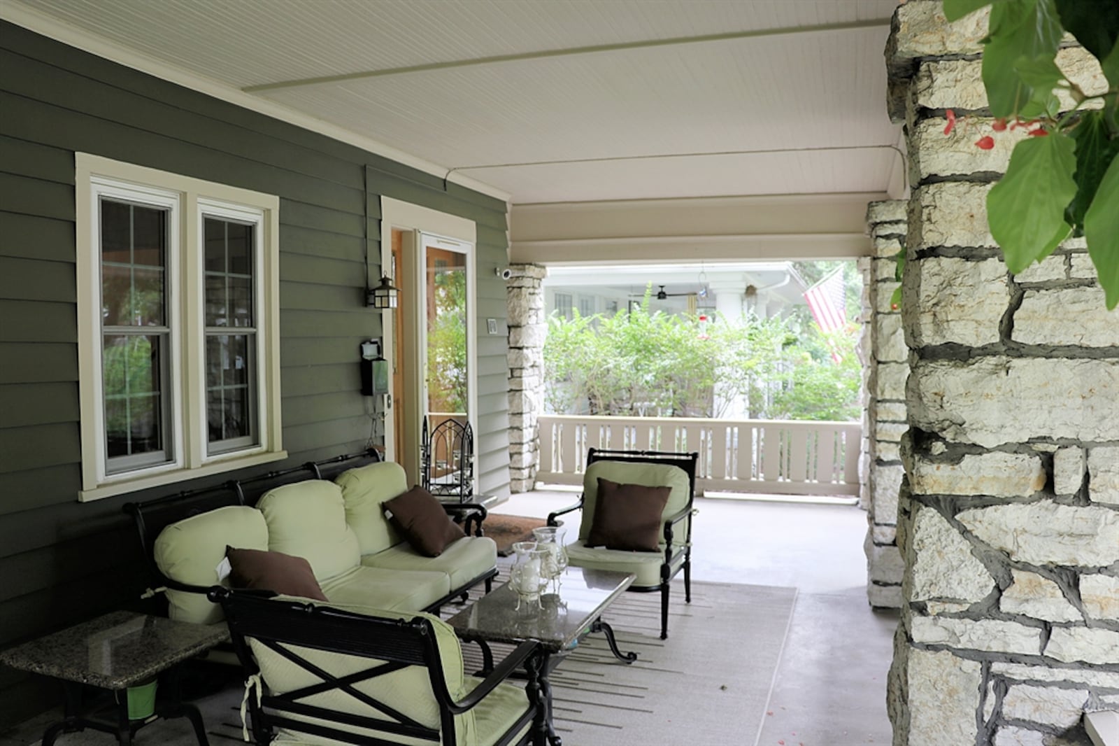 The inviting porch covers the formal front entry of this Oakwood home.