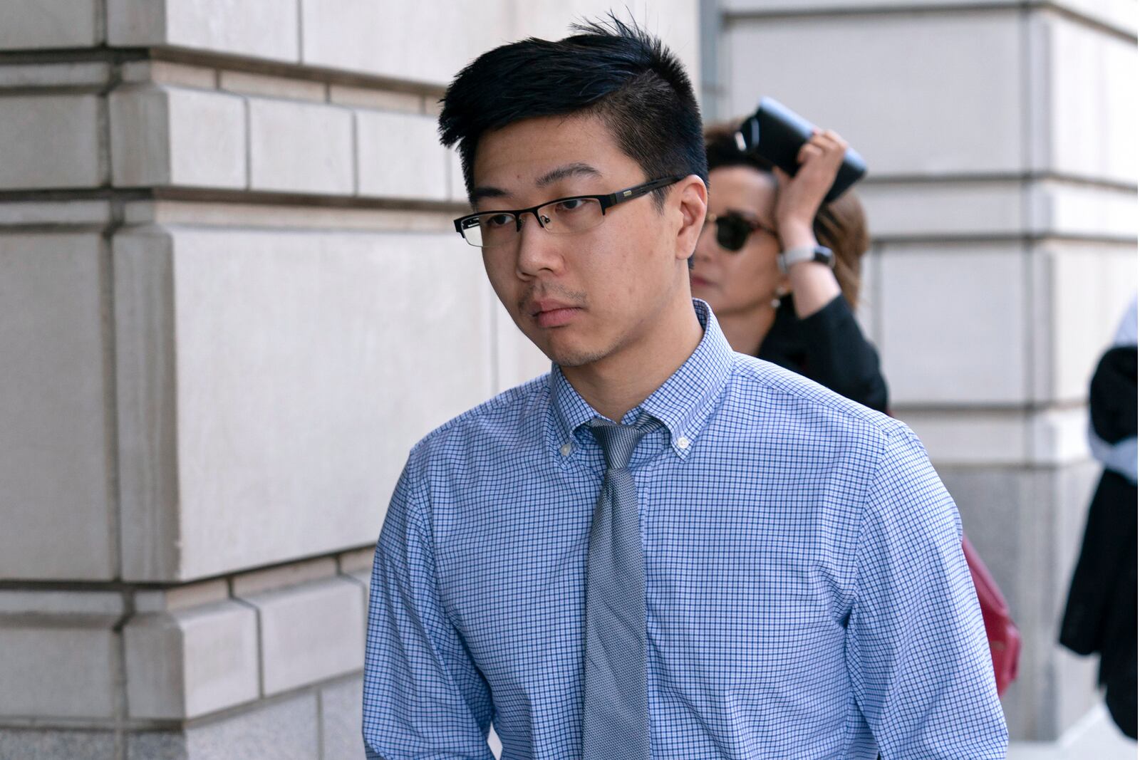 FILE - Montgomery County police officer Justin Lee arrives to the U.S. Federal Courthouse in Washington, Aug. 23, 2024. (AP Photo/Jose Luis Magana, File)