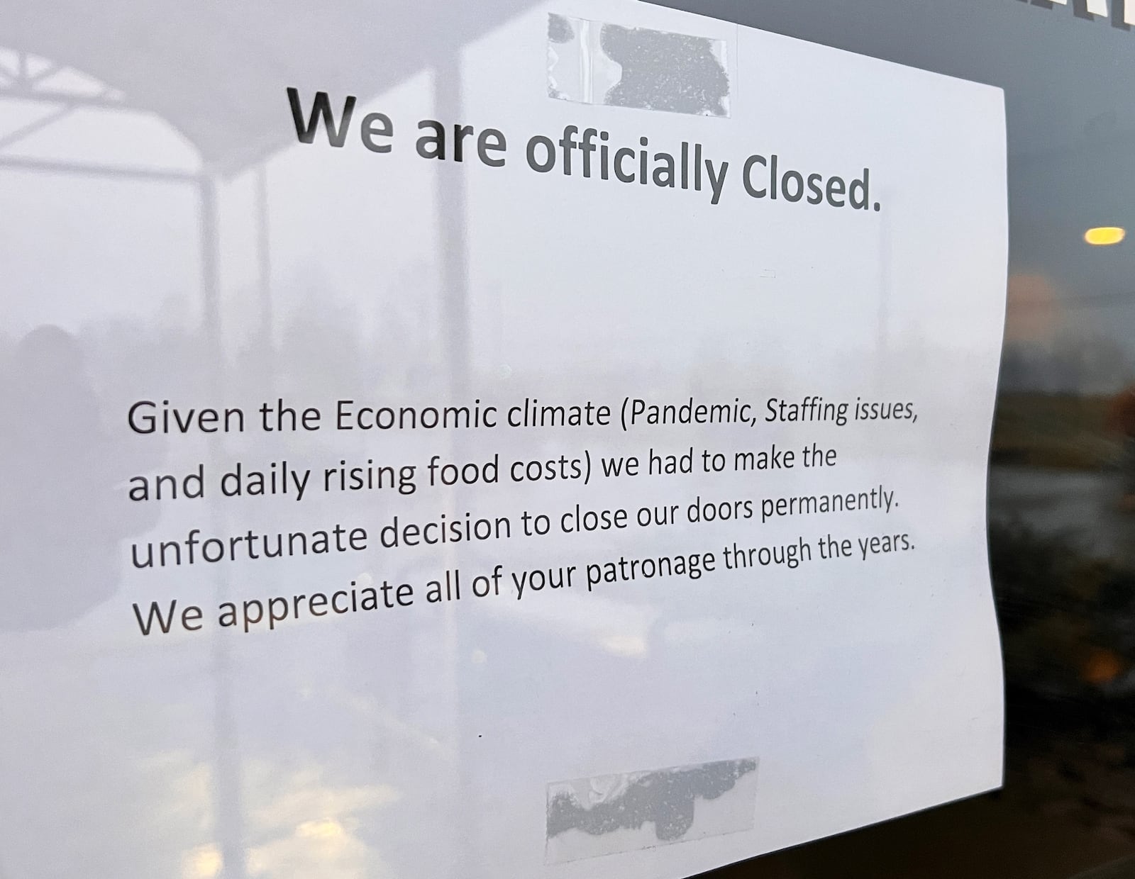 Signs hanging at Rivertown Brewery & Barrel House in Monroe say the place is staying closed permanently. NICK GRAHAM / STAFF