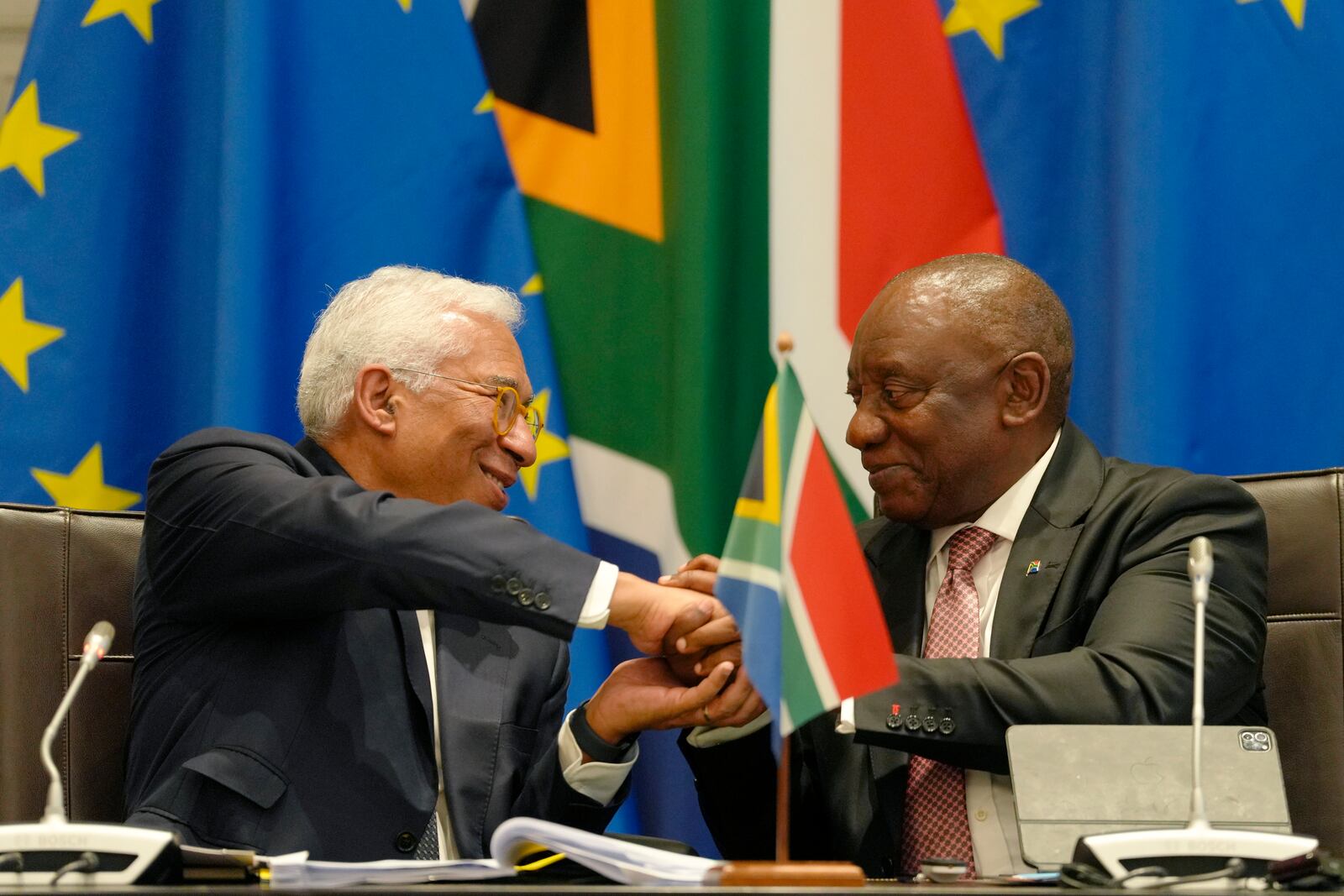 European Union Council President Antonio Costa, left, shakes hands with South Africa's President Cyril Ramaphosa during the opening remarks at the eighth EU-South Africa summit in Cape Town, South Africa, Thursday, March 13, 2025. (AP Photo/Nardus Engelbrecht)