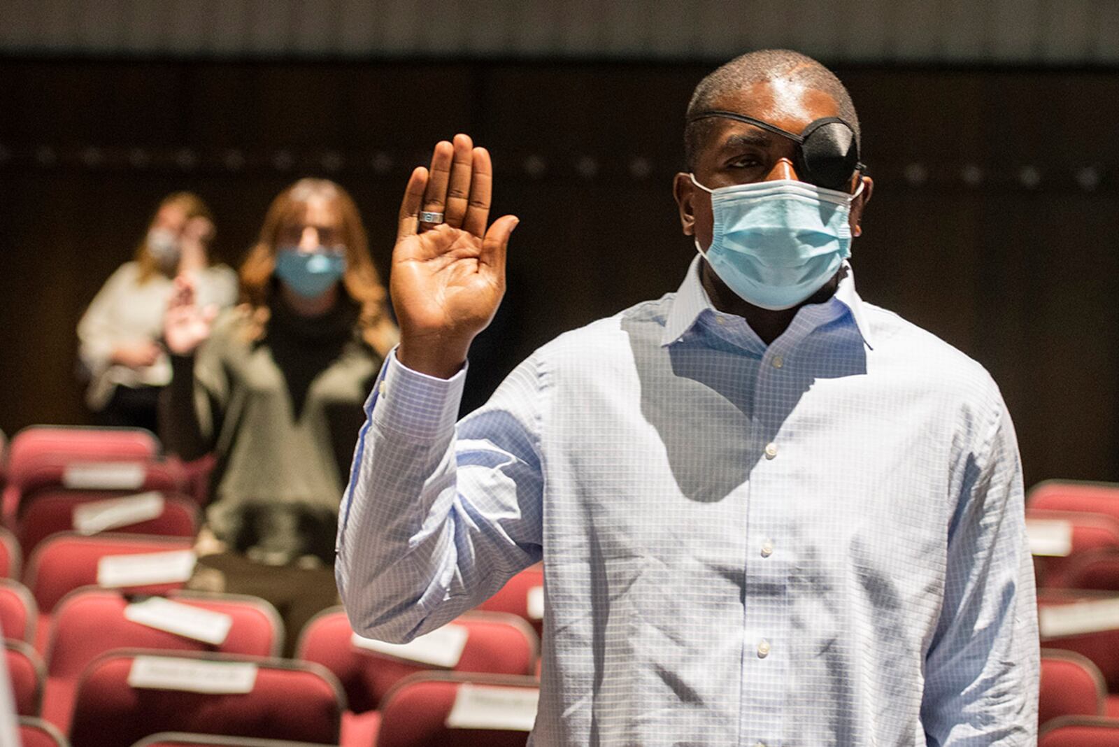 Michael Hargett Jr. and other new civilian hires take the oath of office during their onboarding on April 26 at Wright-Patterson Air Force Base. U.S. AIR FORCE PHOTO/WESLEY FARNSWORTH