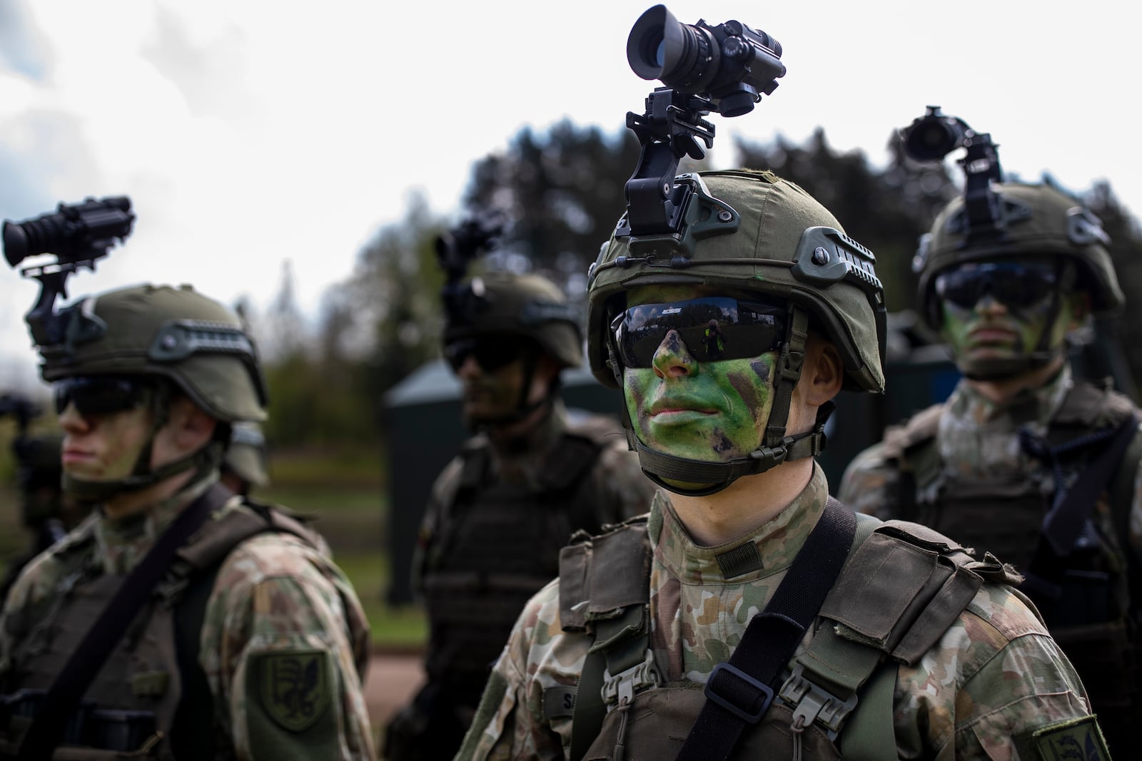 FILE - Lithuanian Army soldiers take part in a Lithuanian-Polish Brave Griffin 24/II military exercise near the Suwalki Gap near the Polish border at the Dirmiskes village, in Lithuania on April 26, 2024. (AP Photo/Mindaugas Kulbis, File)