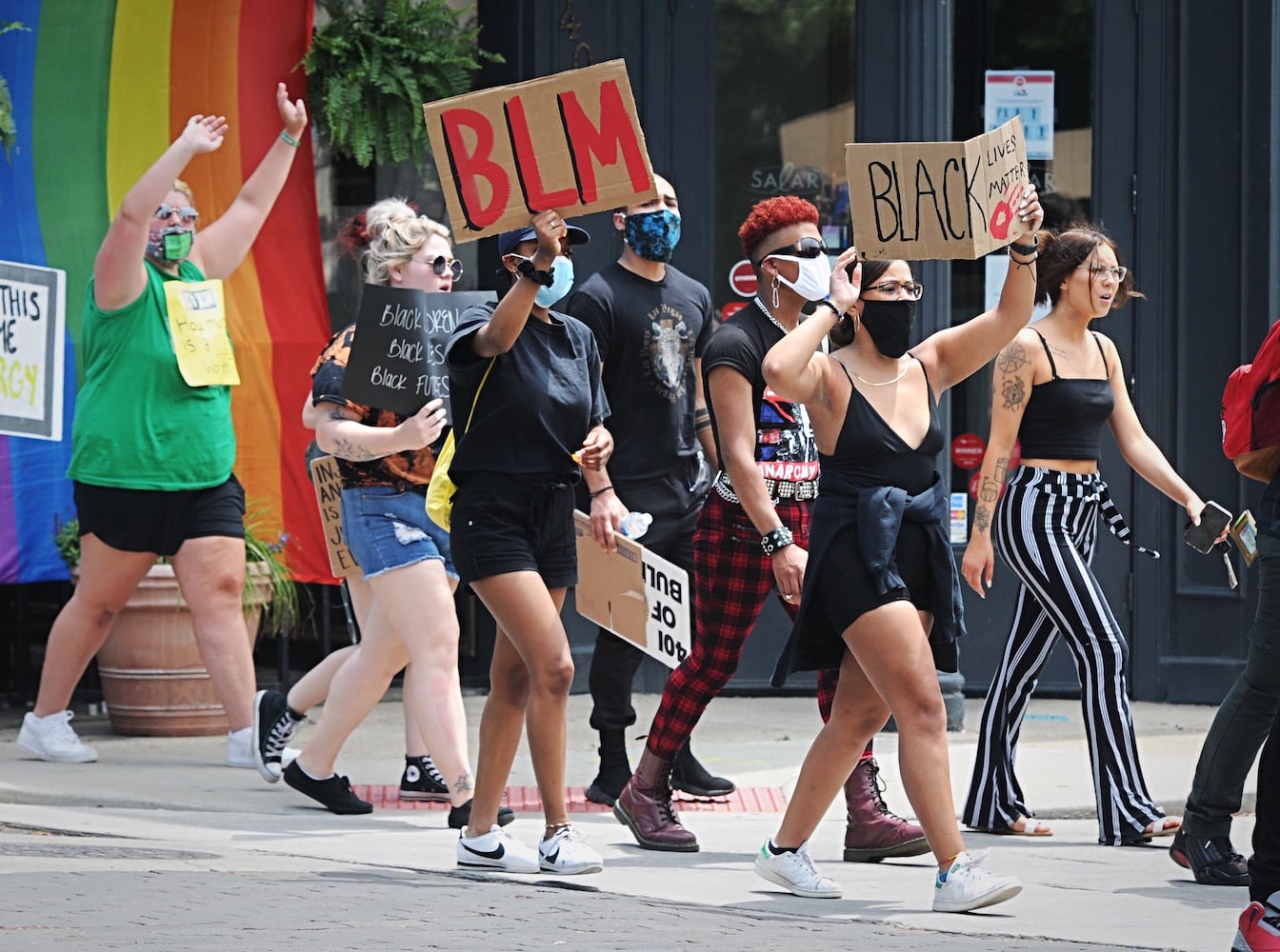 PHOTOS: Protestors march through the Oregon District Thursday