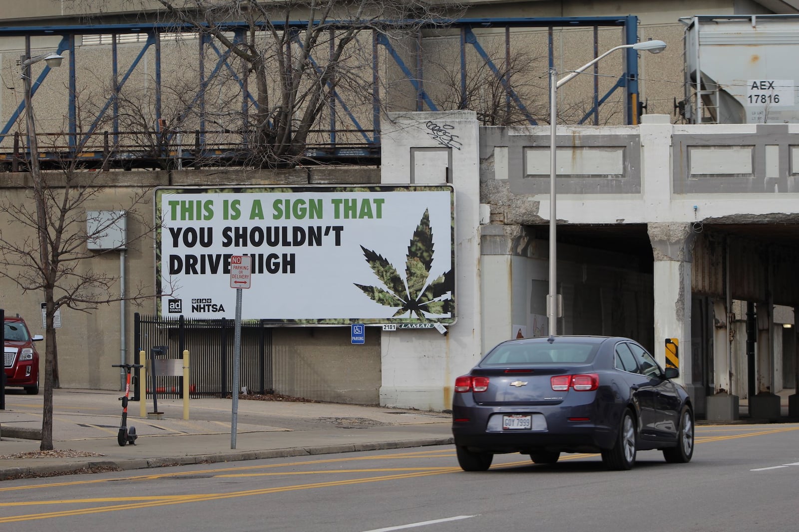 A billboard on South Jefferson Street in downtown Dayton warns motorists against driving stoned on marijuana. Critics of marijuana decriminalization say they fear removing penalties for pot possession can lead to more impaired driving and other public safety concerns. CORNELIUS FROLIK / STAFF