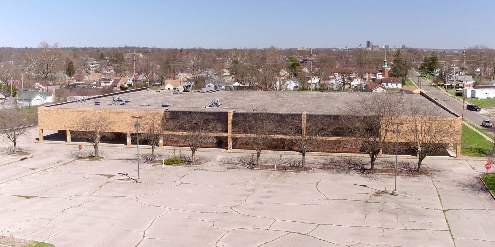 Shuttered Kroger store on North Gettysburg Avenue in Dayton.  Ten years after the only Kroger on the west side of Dayton closed, beginning the onset of a food desert for people living here, the Aldi in the Westown Shopping Center closed its doors in April.     TY GREENLEES / STAFF