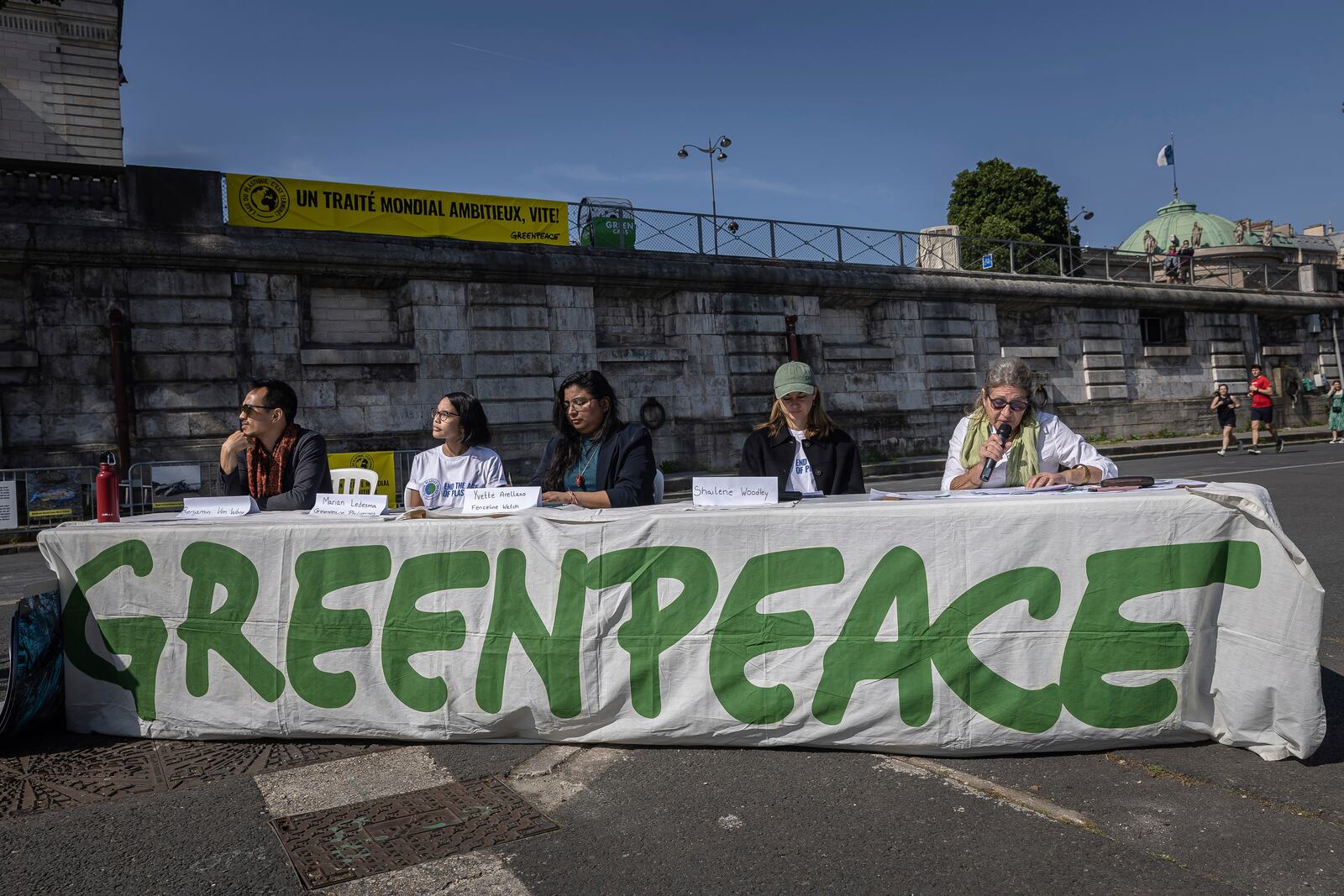 FILE - Members of Greenpeace press conference next to a giant art installation called 'Perpetual Plastic Machine' ahead of Global Plastic Treaty talks Saturday, May 27, 2023 in Paris. (AP Photo/Aurelien Morissard,File)