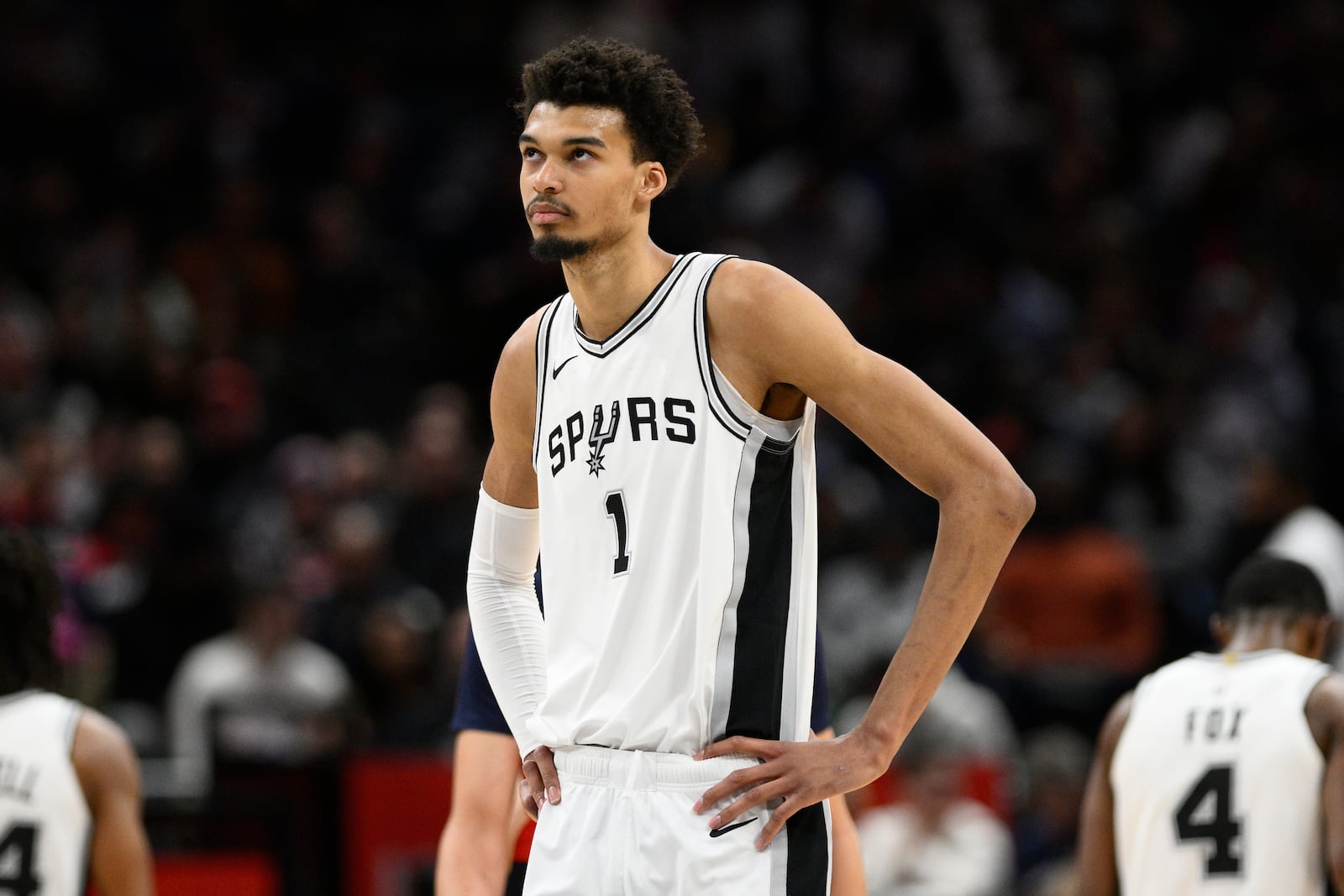 FILE - San Antonio Spurs center Victor Wembanyama (1) looks oon during the second half of an NBA basketball game against the Washington Wizards, Monday, Feb. 10, 2025, in Washington. (AP Photo/Nick Wass, File)