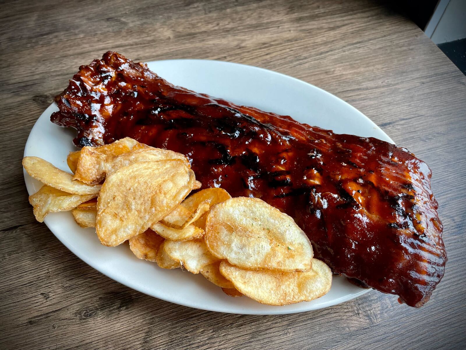 Butterbee’s American Grille, a family friendly, sports-themed restaurant and bar, is open in Xenia next door to Skyline Chili on Progress Drive. NATALIE JONES/STAFF