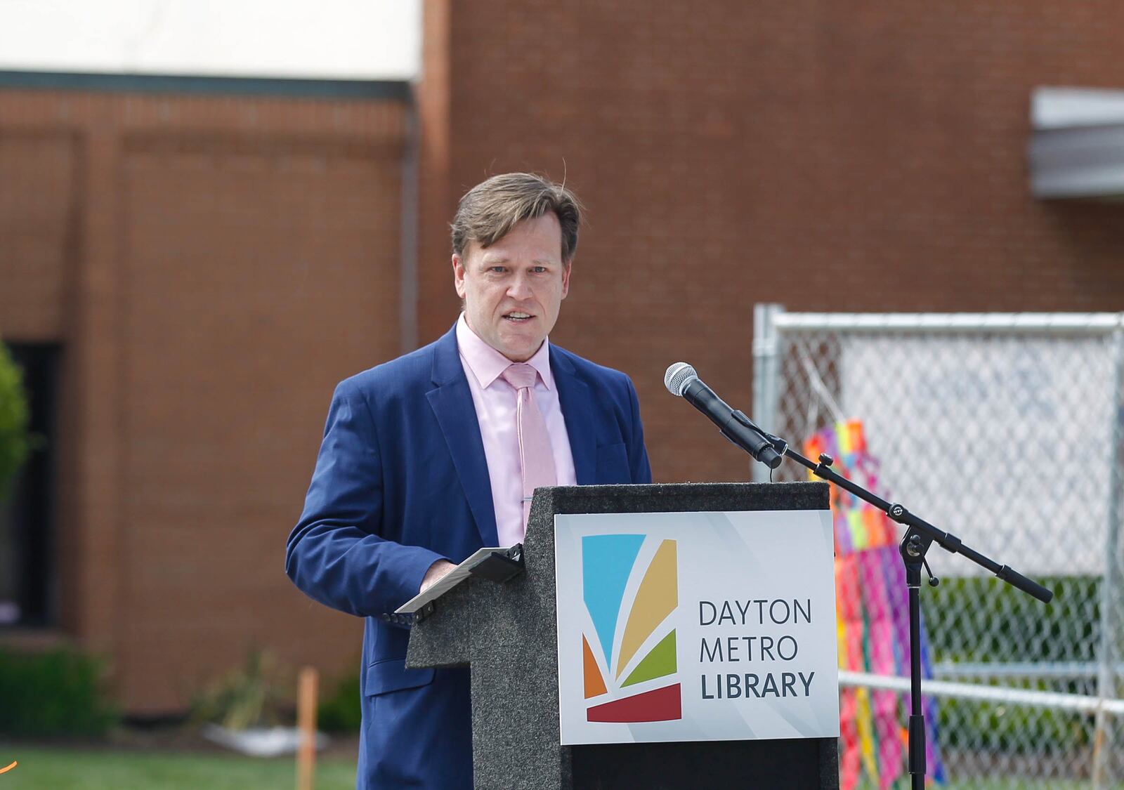 Jeffrey Trzeciak, Dayton Metro Library's new executive director, speaks at his first public event, the groundbreaking for the new Burkhardt Branch Library. CHRIS STEWART / STAFF