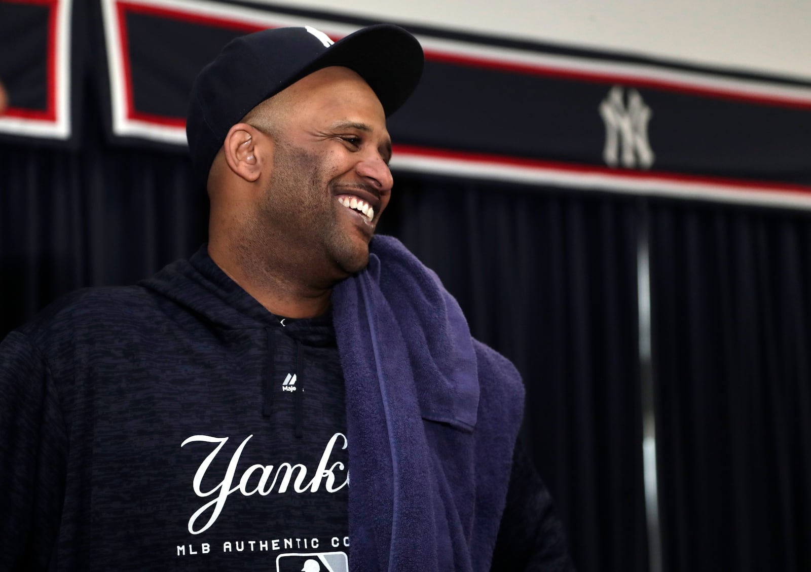 FILE - New York Yankees starting pitcher CC Sabathia smiles after a news conference at the New York Yankees spring training baseball facility, Saturday, Feb. 16, 2019, in Tampa, Fla. (AP Photo/Lynne Sladky, File)