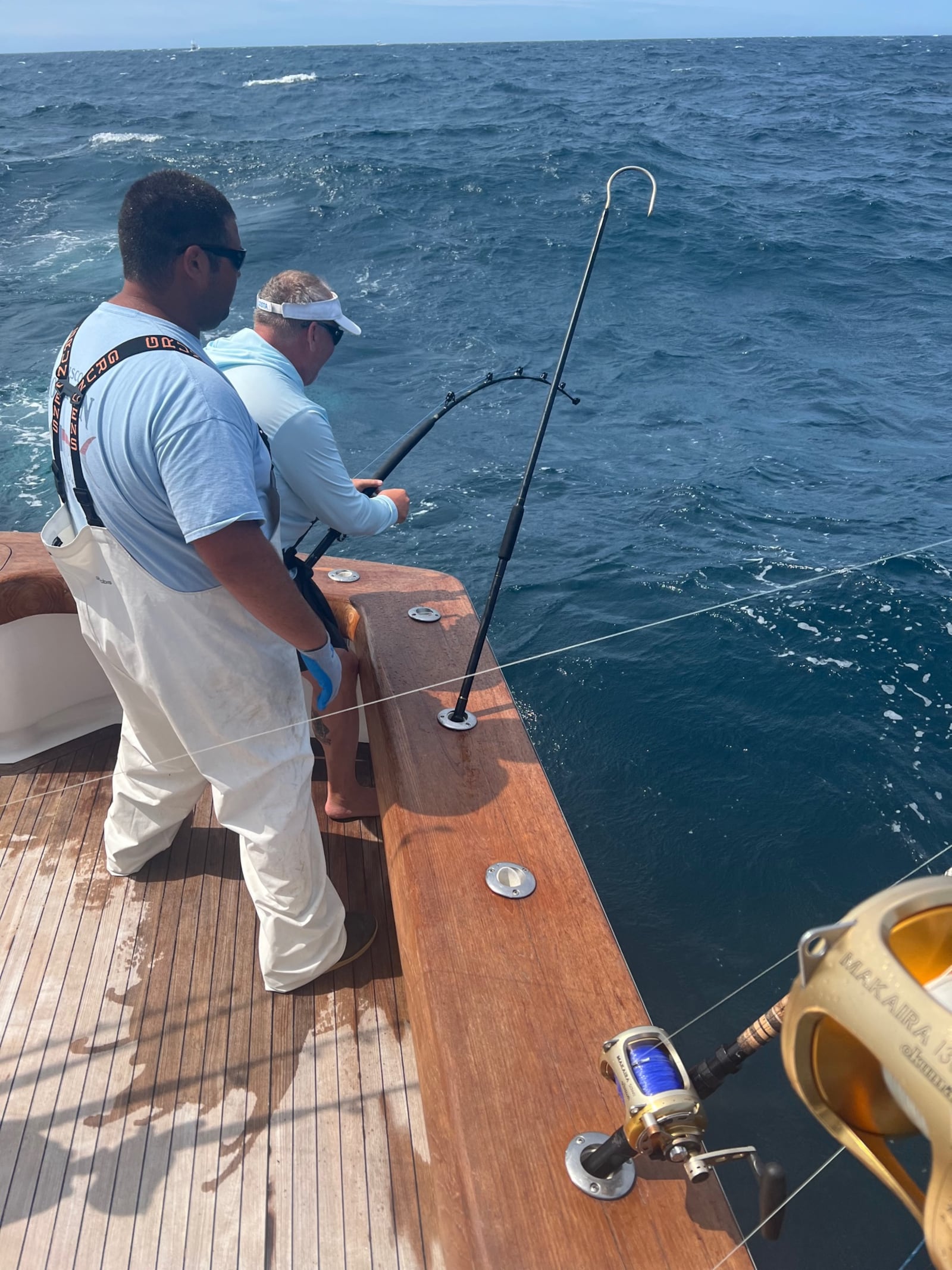 Rob Jones, on the rod, bringing in Team Buckeye Tuna’s winning catch – a 220.5 pound bigeye tuna – that won the Dayton-based team the 1,007,012.00 first place prize at the White Marlin Open, the world’s largest and richest billfish tournament in Ocean City, Maryland. Looking on is mate Drew Kegreiss. CONTRIBUTED