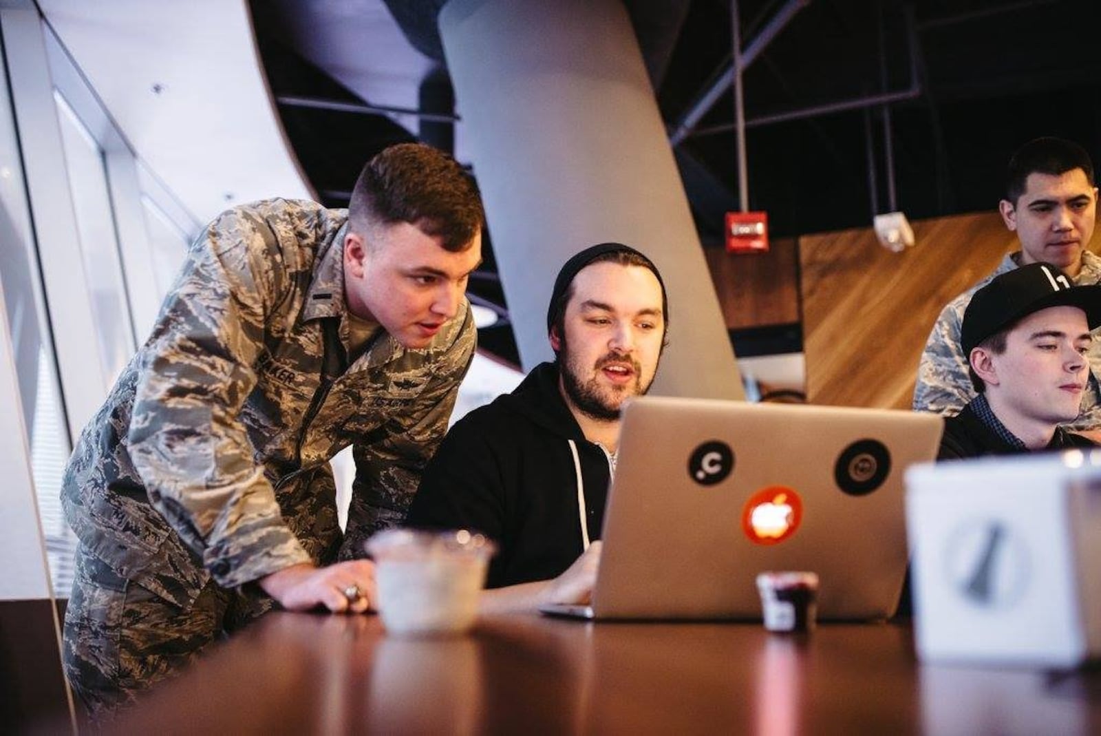 First Lt. Stephen Baker, 352nd Cyber Operations Squadron, watches as one of the Hack the Air Force 2.0 participants attempts to breach the security on a military website in December 2017. Photo by HackerOne