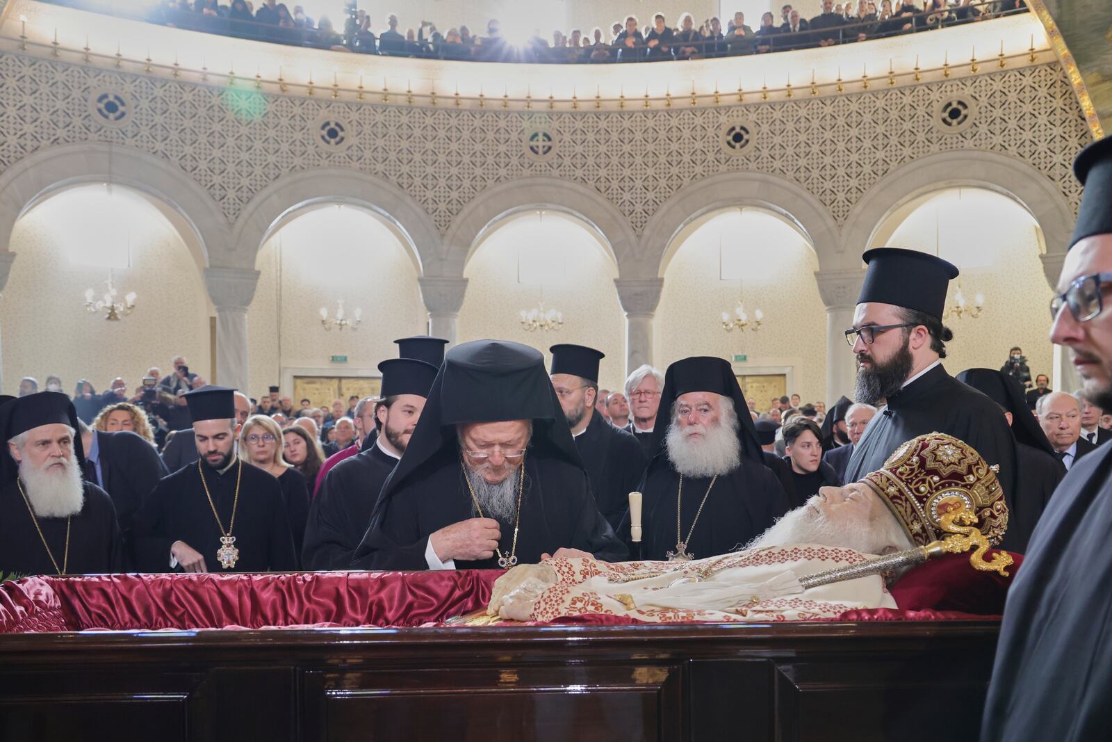 Ecumenical Patriarch Bartholomew I, the spiritual leader of the world's Orthodox Christians, pays his respects to the late Archbishop Anastasios of Tirana, Durres and All Albania during his funeral, inside the Cathedral of the Resurrection of Christ, in Tirana, Albania, Thursday, Jan. 30, 2025. (AP Photo/Vlasov Sulaj)